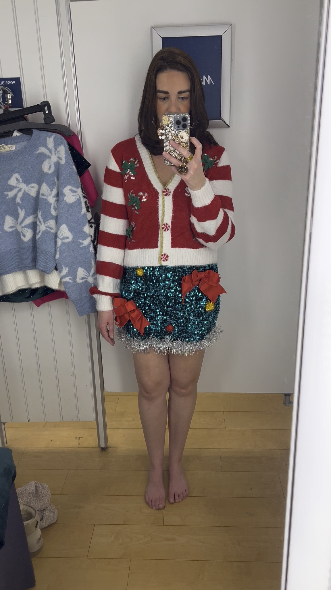 Candy cane striped cardigan (small). Christmas green sequin skirt (small). #cardigan #sweater #stripedcardigan #winteroutfits #earrings #candycanecardigan #winteroutfit #holidayoutfit #greenskirt #skirt #sequinskirt #christmasskirt Winter Outfit 

#LTKStyleTip #LTKFindsUnder100 #LTKSeasonal