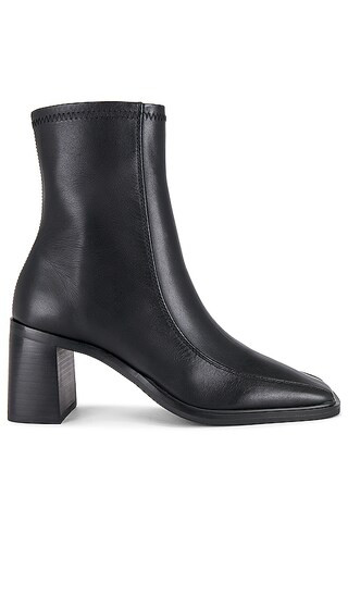 Dusty Heeled Boot in Black Como | Revolve Clothing (Global)