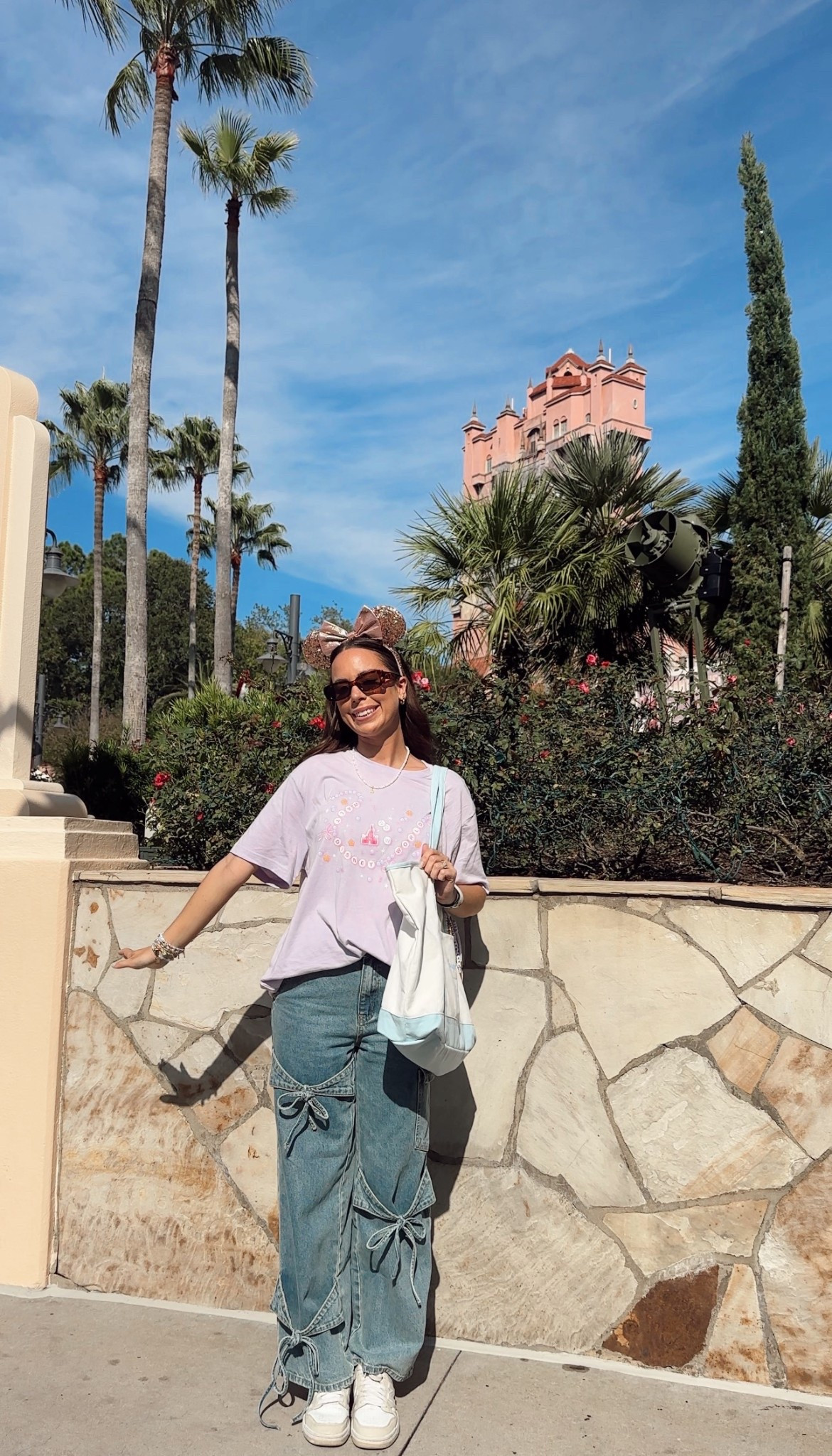 My fav shop cider wide leg bow jeans🎀 Disney ootd, Disney outfit, Disney style, Disney girl, Disney Inspo, Disney ideas, rose gold Mickey ears, Disney accessories 

#LTKSaleAlert #LTKTravel #LTKootd