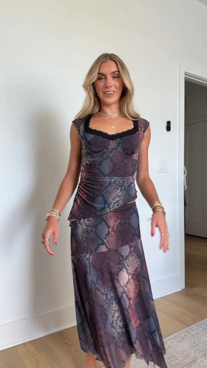 Walmart size xs. Serve sleek, statement energy in Madden NYC's Asymmetrical Lace Top. Designed in sheer, printed mesh with a double-layer bodice for coverage, the asymmetrical silhouette skims your curves for a flirty fit and charms with delicate lace trim on the sweetheart neckline. Ready for nights out, rooftop plans or whatever the vibe calls for. Edgy or feminine—there are so many ways to style Madden NYC's Asymmetrical Midi Skirt. Crafted in layers of lightweight mesh, one printed, one solid, this skirt enchants with an asymmetrical hip seam and uneven hanky hem. Heading out for the night? Slip it on with a tee and moto jacket or get date-night ready with a cute cardi and leather boots, either way, this skirt is sure to rock your wardrobe.

#LTKootd #LTKdayinmylife #LTKSeasonal