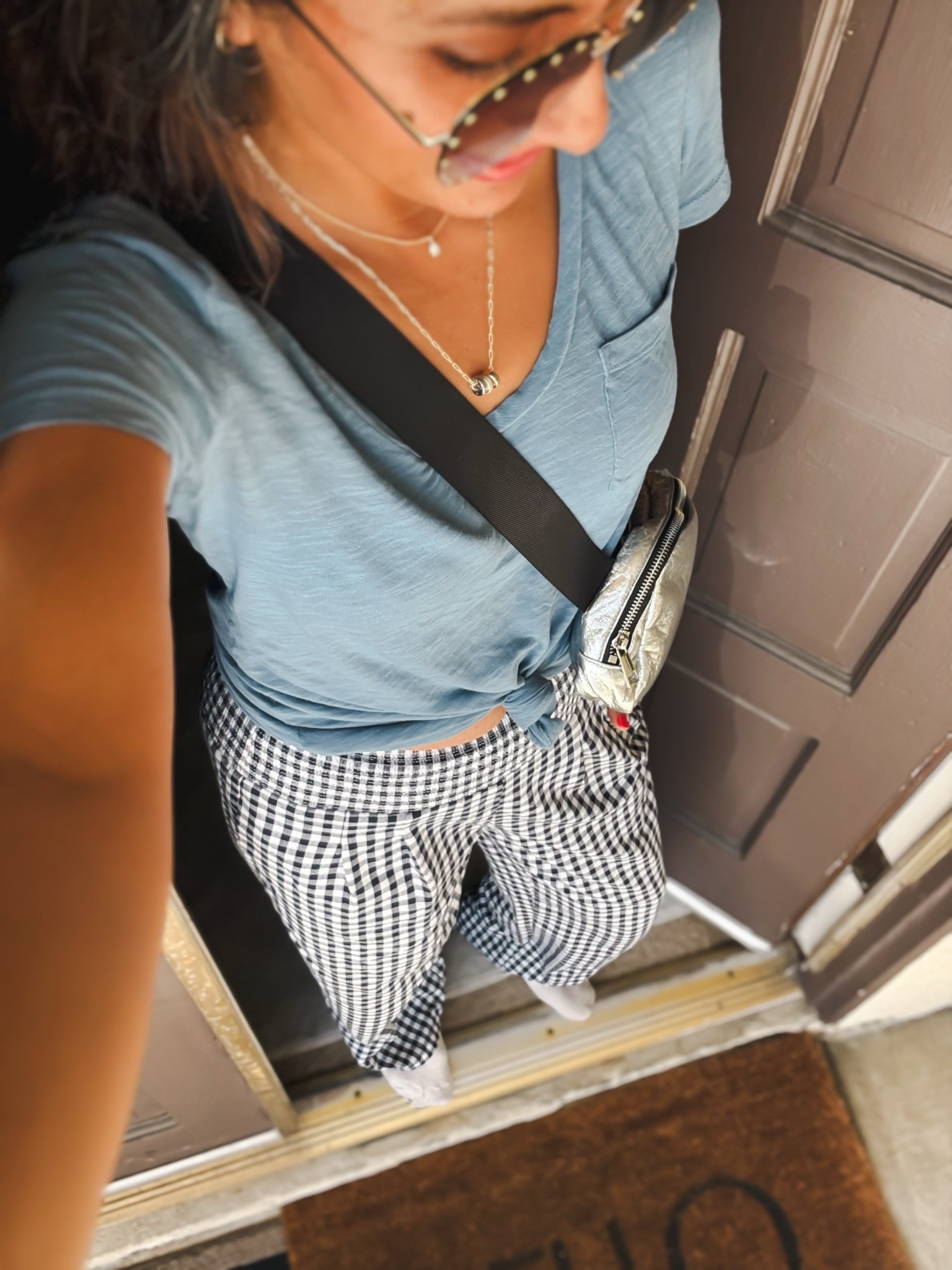 Easy everyday outfit but make it chic 🤍✨
I styled this oversized tee tucked under my bra for that effortless, cinched look (trust me… game changer 🙌). Paired it with these lightweight gingham pants for the perfect casual + put-together vibe.

This is my go-to for running errands, coffee runs, or just feeling cute and comfy without trying too hard. Add a statement sunglass + pop of color bag and you’re instantly elevated 💙

Everything is easy to mix, match, and rewear all season long!


casual outfit, everyday style, oversized tee outfit, t shirt styling hack, tucked shirt trick, gingham pants outfit, spring outfit ideas, summer casual look, mom style outfit, effortless chic outfit, comfy outfit ideas, relaxed fit outfit, neutral outfit with pop of color, street style casual, minimal chic outfit, airport outfit idea, coffee run outfit, laid back fashion, simple outfit inspo

#casualstyle #everydayoutfit #ootdstyle #springoutfits #summerstyle #effortlessstyle #momstyle #comfychic #outfitinspo #ltkstyle #ltkfashion #amazonstyle #ginghamstyle #neutralstyle #streetstyle

#LTKmomlife #LTKootd #LTKSeasonal