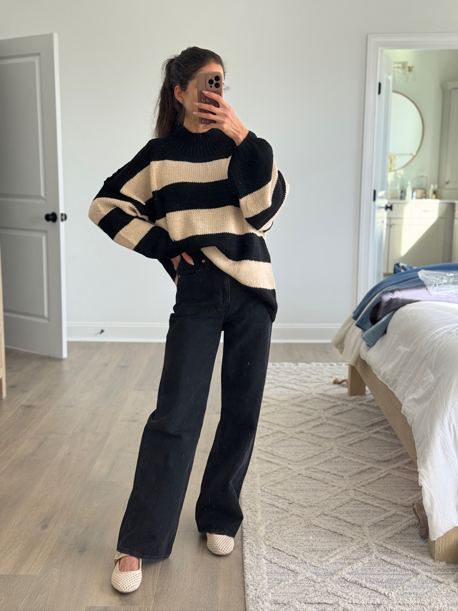 Neutral outfit inspiration with an oversized striped sweater and black wide leg jeans. Easy everyday outfit, casual chic style, fall outfit ideas, winter outfit basics, neutral color outfit, relaxed fit sweater, wide leg denim, comfortable everyday fashion, simple capsule wardrobe pieces.


#LTKWorkwear #LTKFindsUnder50 #LTKSeasonal