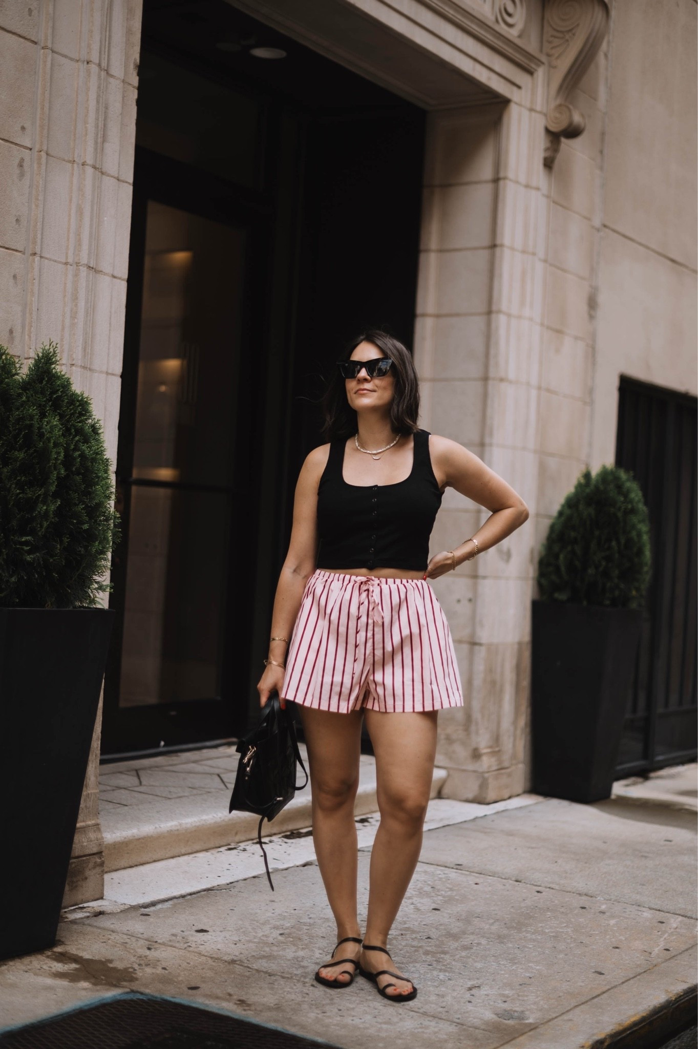 Striped pull on shorts and a black tank that’s old Sezane. Easy summer outfit.

#LTKootd #LTKgrwm #LTKstorytime