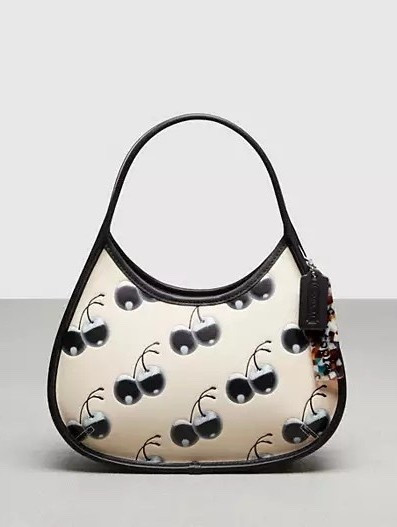 Coachtopia cherry print bag 

#LTKwinter #LTKuk #LTKgiftguide