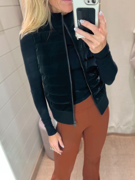 Seriously obsessing over this velvet looking nylon puffer vest. It’s slightly cropped with a knit waist and mock neck collar giving it a great fitted look.  Wearing the xs but probably will go down to xxs.  You can easily wear this to the gym or out with a pair of black pants or over a dress.

I’m also in love with this flared legging I’m so happy it’s back and I already have two pairs.

#activewear #PufferVest #WinterJackets #Giftsforher #GiftsForMom

#LTKGiftGuide #LTKfit #LTKCyberweek