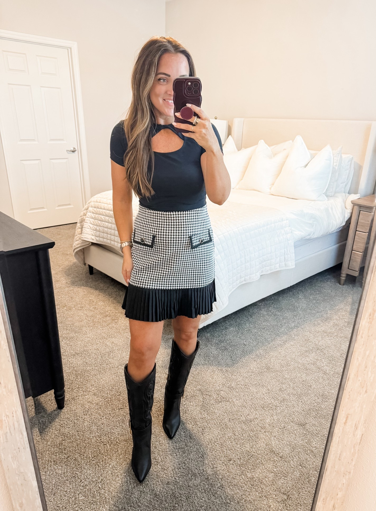 Skirt / Top - M (tts) 
5’2” 140 lbs 
—
Amazon skirt | Amazon outfit | Amazon look | Black boots | Western style boots | Dolce Vita boots | Houndstooth | Black and white | Keyhole neck 

#LTKootd #LTKValentine #LTKWorkwear
