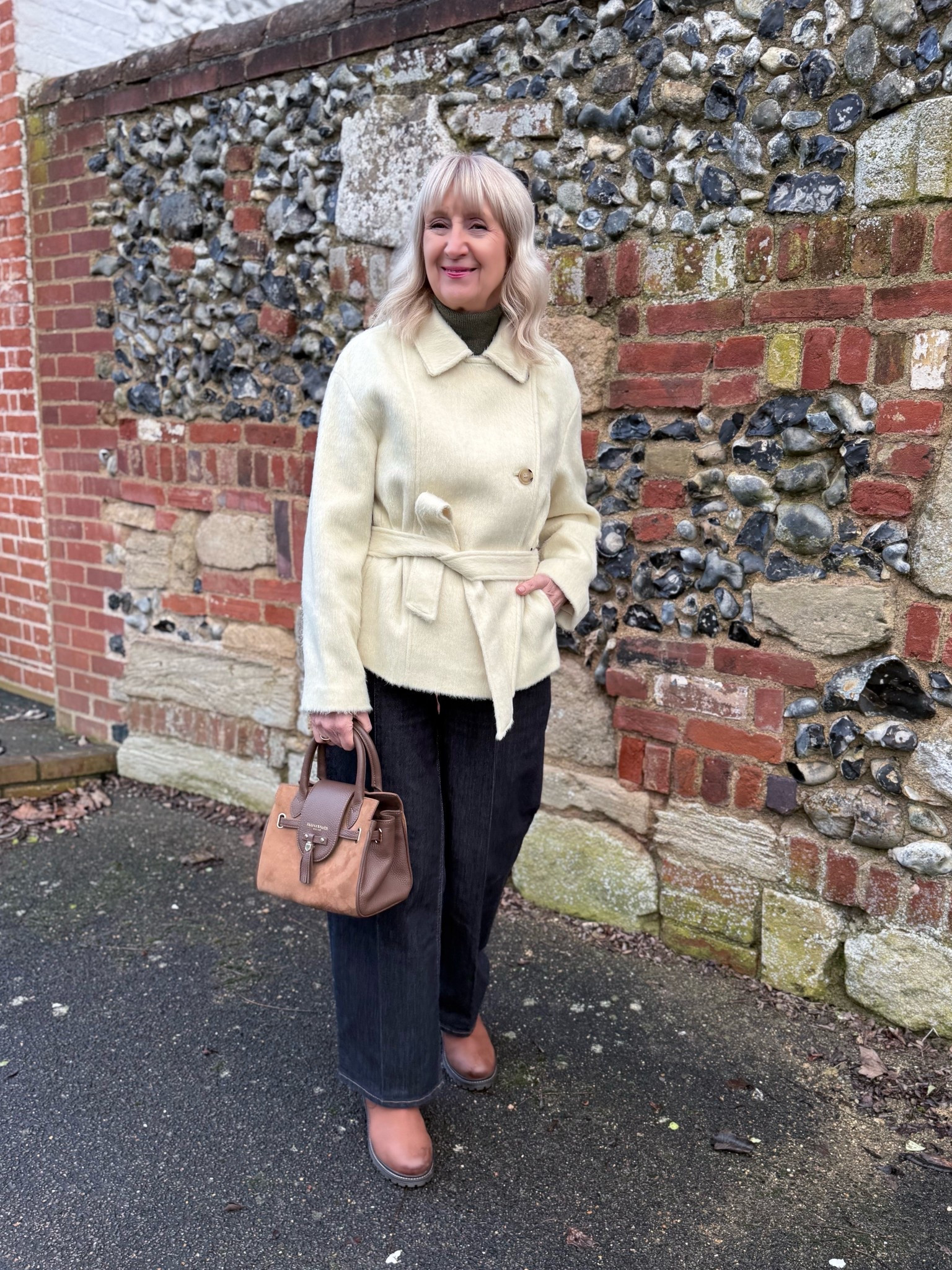 Spring ready jacket for the winter months. Warm yellow / cream wrap over jacket with premium denim high rise wide leg jeans and tan boots 

#LTKuk #LTKspring #LTKwinter