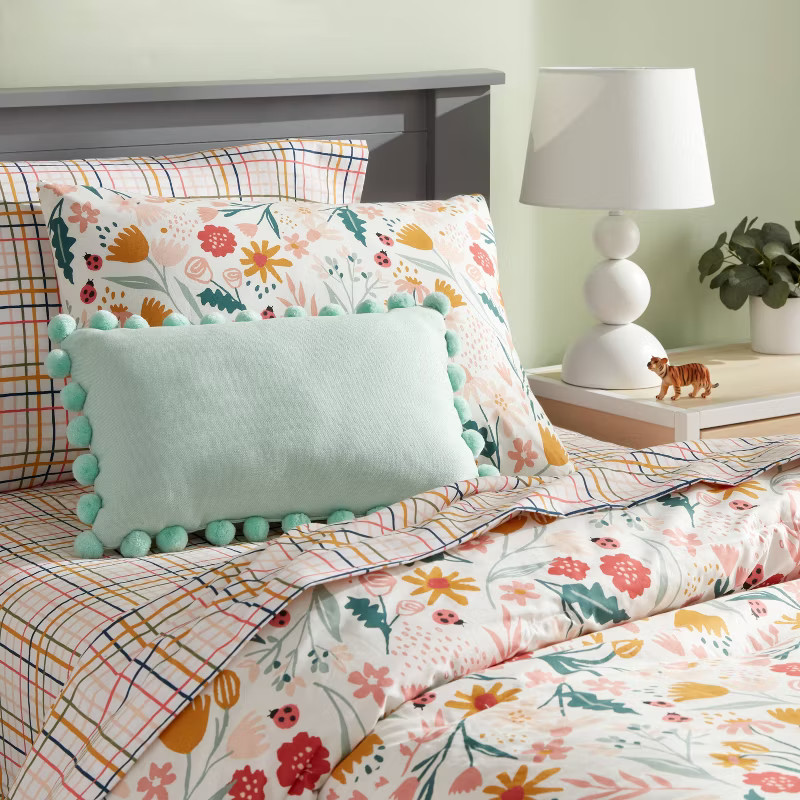 Oblong Pom-Pom Throw Pillow - Pillowfort™ | Target