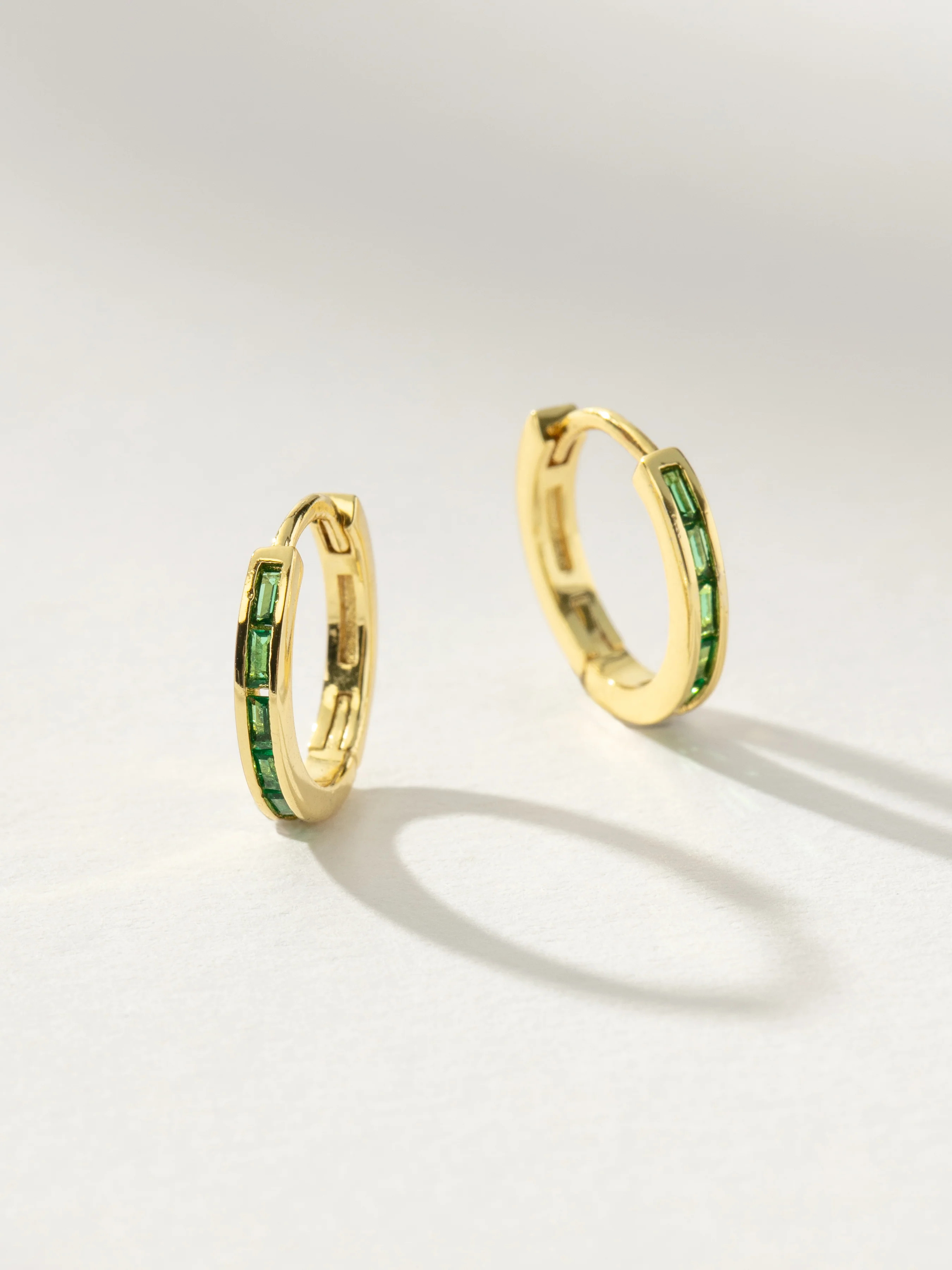 Baguette Cut Green Stone Huggie Earrings in Gold | Uncommon James | Uncommon James