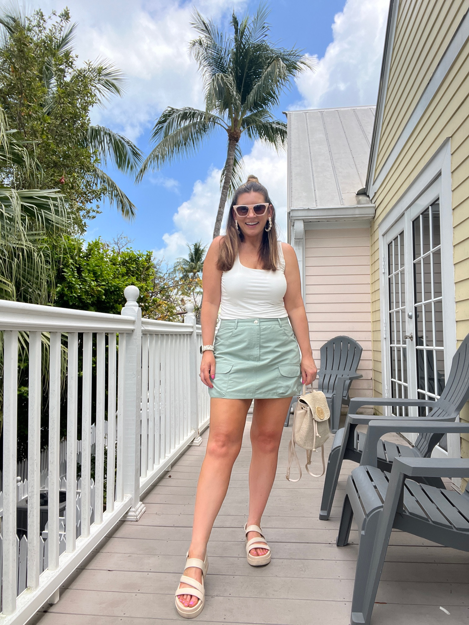 Amazon tank, Lulu’s sage green skort, mini skirt, sandals, Amazon sunglasses, straw bag, backpack, casual outfit, summer outfit inspo 

#LTKstyletip #LTKitbag #LTKtravel