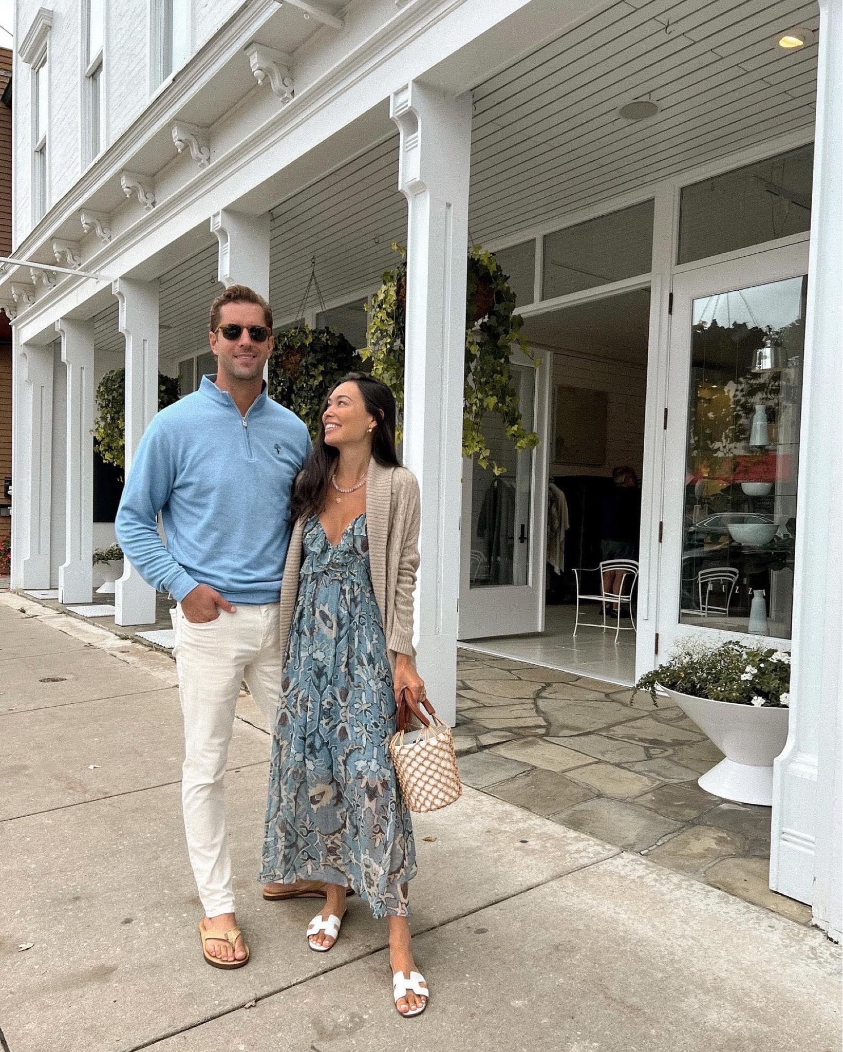Kat Jamieson of With Love From Kat wears a pre-fall outfit with a Ralph Lauren cashmere cardigan and blue floral midi dress. 

#LTKstyletip #LTKtravel #LTKSeasonal