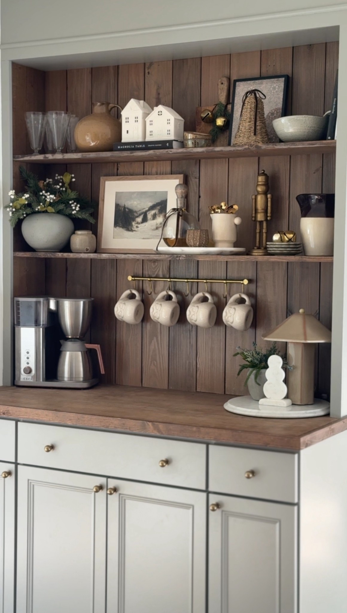 Holiday Coffee Bar | Coffee bar essentials | Christmas decor | nutcracker | woven bell | marble tray | marble snowman | Santa mug | cafe coffee maker | espresso machine | Etsy winter prints | vintage pitcher | vase | magnolia home | stir spoons | studio McGee lamp | 

#LTKHome #LTKFindsUnder50 #LTKHoliday