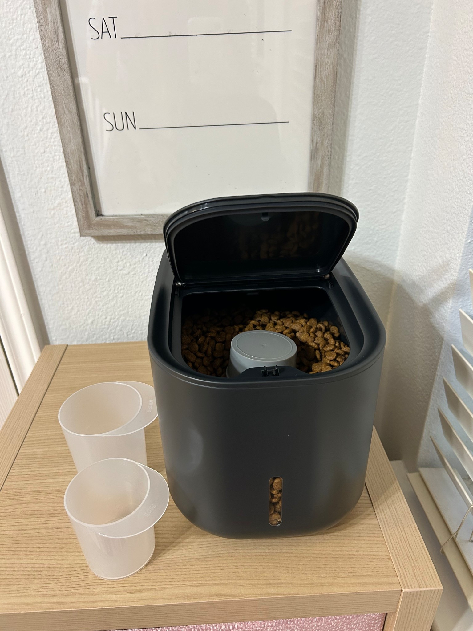 Perfect pet food storage container with cups included!!! 

#LTKmorningroutine #LTKmomlife #LTKdayinmylife
