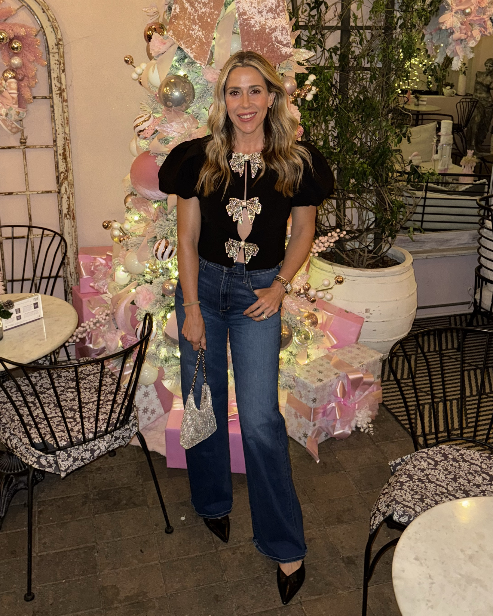 Holiday season is here ! And with that comes fun and sparkly outfits!!! This top is so cute, runs true to size and is perfect for the holidays. Paired with some of my favorite jeans, which I sized down to a 27. 

#LTKHoliday #LTKFindsUnder50 #LTKOver40