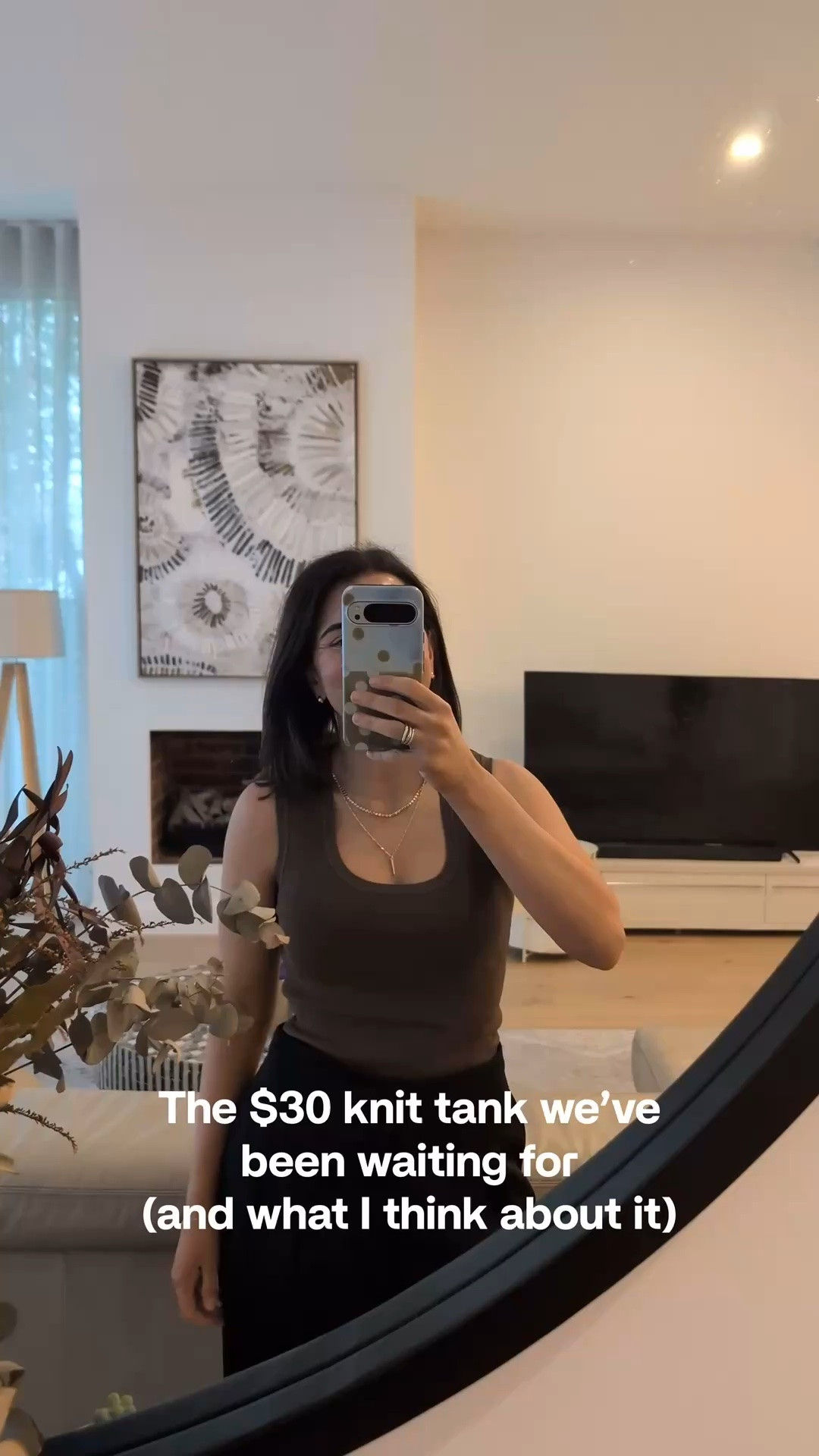 Everyone’s calling this the $30 Henne Maiken dupe. Is it a dupe? Ehhh… I’m going to say *almost*.

Let’s start by saying it’s a great tank for $30. Gosh, it’s even a great tank for $50.

It’s definitely similar to the Maiken, but there are a few differences. The neckline is different, the back is different, and it doesn’t have that same halter effect that I think gives the Maiken that really elevated, on trend feel.

BUT this one is bra friendly and, like the Maiken, it gives the girls a very flattering little lift.

So, exact dupe? Maybe not. A really good alternative? Absolutely.

And for $30? Heck yes. It’s worth every penny. Wearing an XS