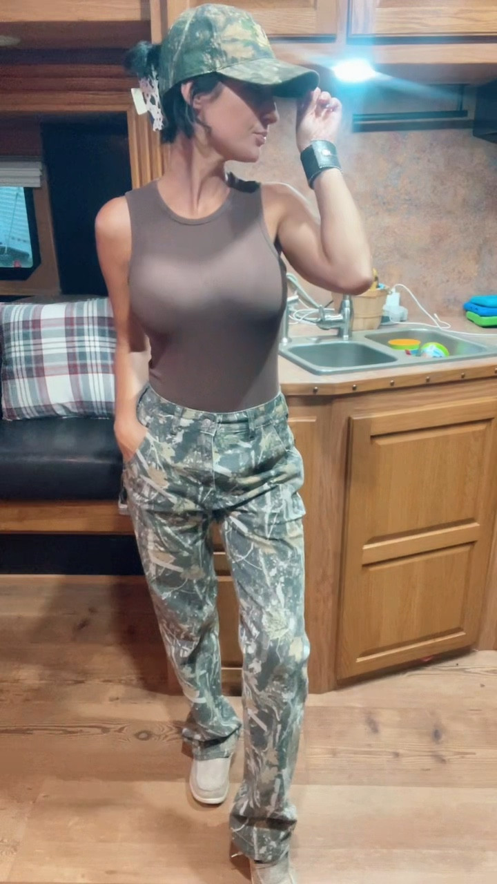 Rodeo mama meets camo fashion 
~camo cargo pants 
~brown tank bodysuit 
~camouflage ball cap 
~western hair clip
~leather cuff bracelet 

#LTKFindsUnder50 #LTKStyleTip #LTKSeasonal