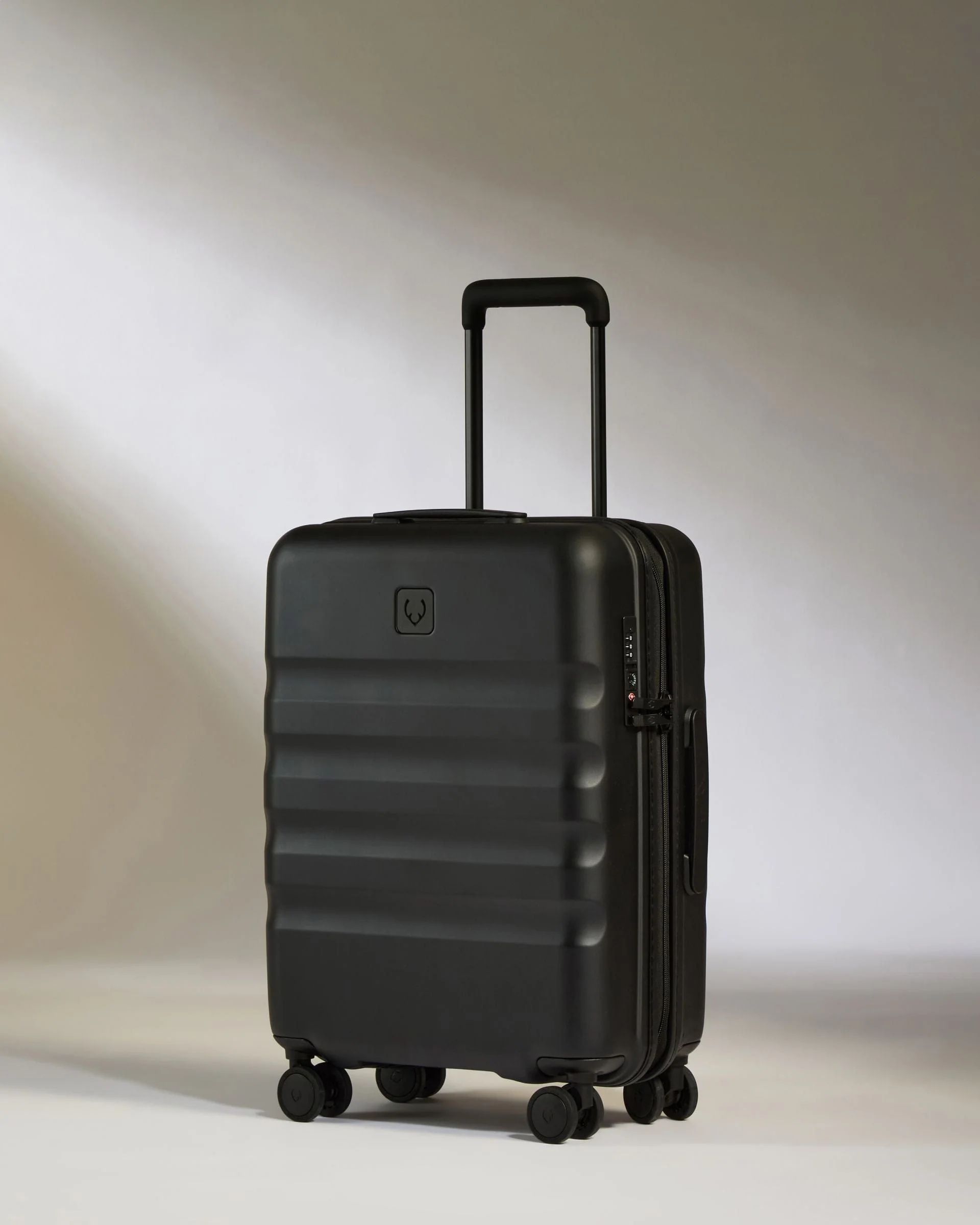 Cabin Suitcase in Black - Icon Stripe | Lightweight & Hard Shell Suitcase | Antler UK