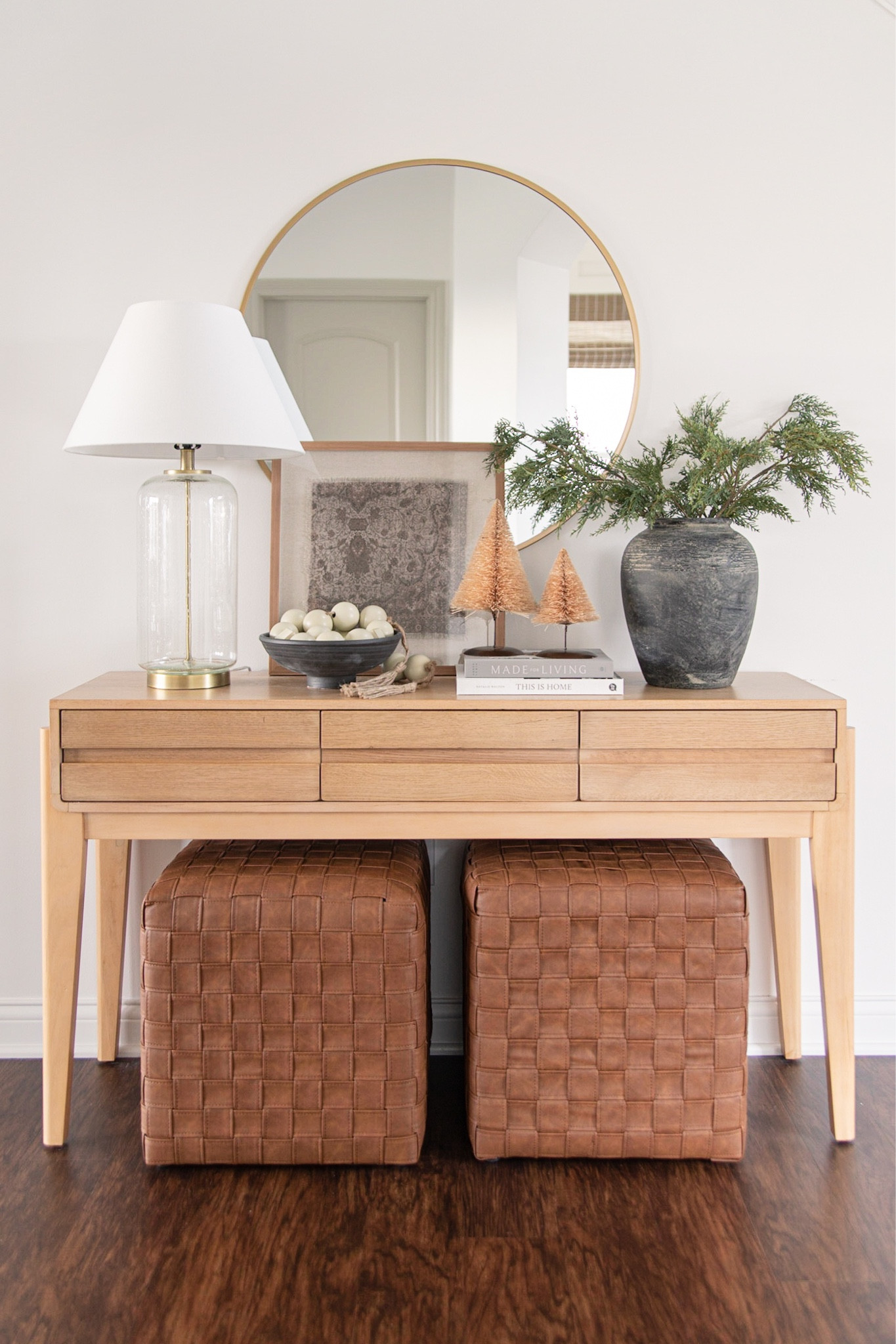 Christmas console table decor, Christmas entryway decor, neutral Christmas decor, minimalist Christmas decor, brown bottle brush trees, white oak console table, faux leather woven cube

#LTKhome #LTKunder100 #LTKHoliday