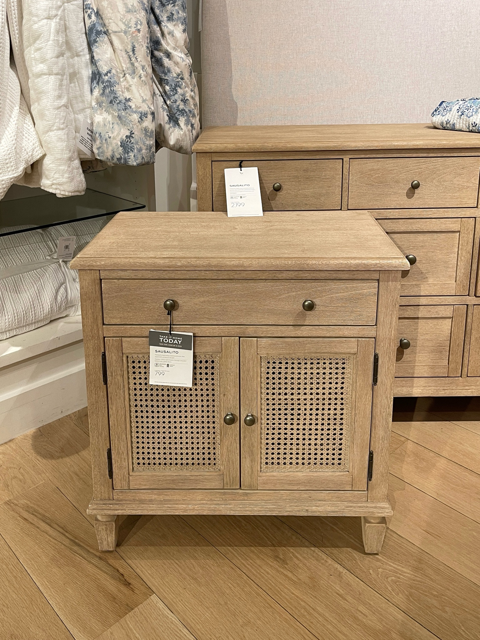 The Pottery Barn Sausalito Cane Cabinet Nightstand in seadrift exudes relaxed refinement. Caned paneling adds natural texture, and the classic design is perfect for a cozy bedroom oasis! Also found some great affordable dupes linked below.

#LTKHome
