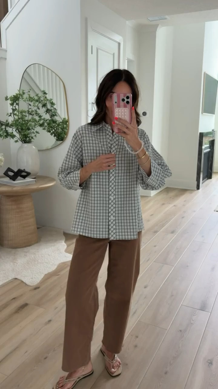 This outfit is such a good mix of relaxed and polished. The lightweight gingham button down has an easy drape that looks great tucked, untucked, or layered, and the brown pants make it feel like an effortless transition into fall without being too heavy for the season.

gingham button down, brown pants, fall outfit, casual outfit, neutral style, lightweight shirt, everyday fashion, women’s clothing, transitional style, effortless outfit, annabrstyle

#LTKootd #LTKSeasonal #LTKOver40