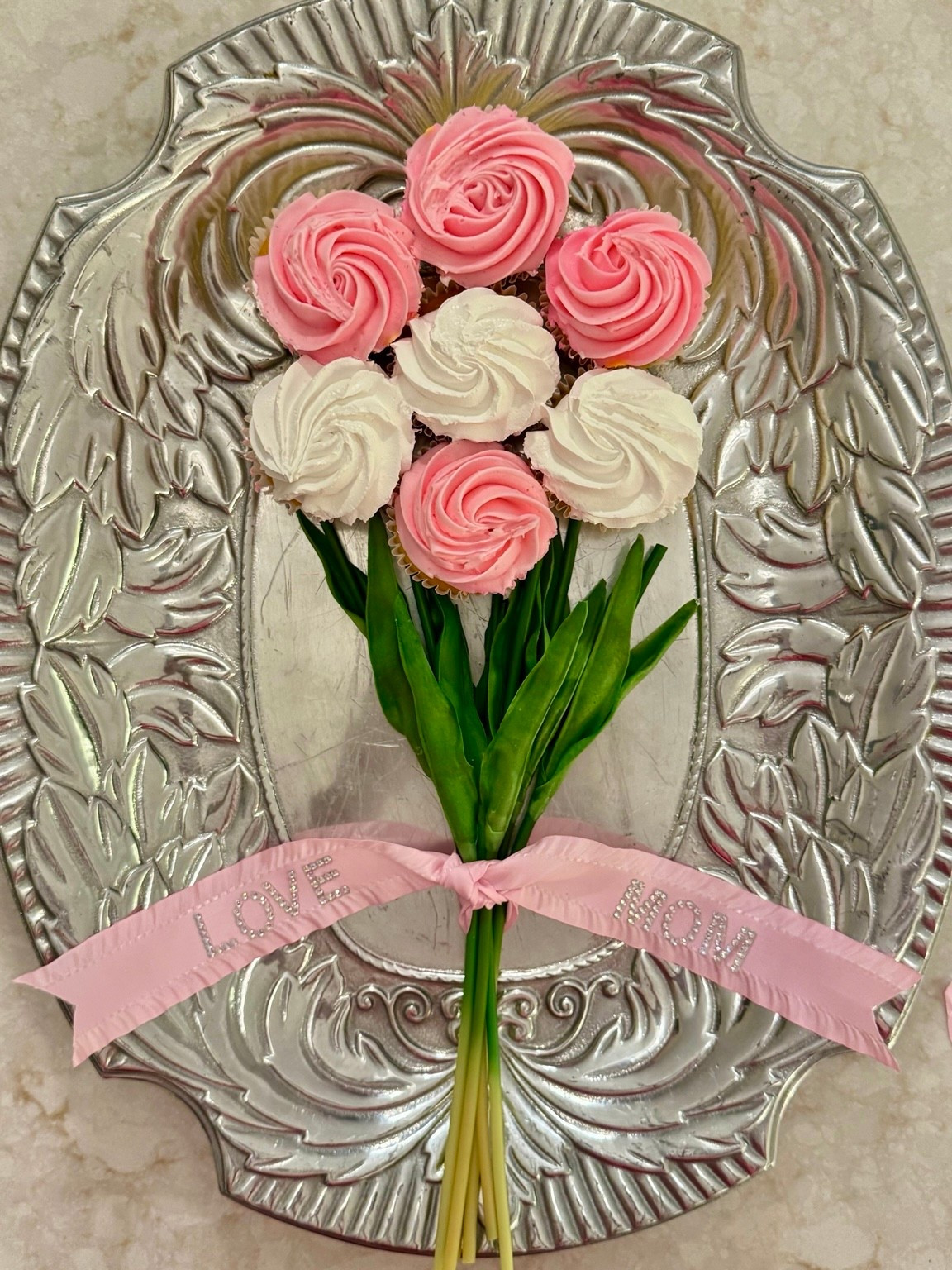 The sweetest bouquet… but make it edible 💕
These cupcake flowers are the prettiest way to elevate dessert for Mother’s Day, brunch, or gifting. I used soft pink + white buttercream with a simple swirl technique and styled them with tulip stems and a personalized ribbon for that extra luxe touch ✨

Shop the look + tools to recreate this in my links 💗

#ltkhome #ltkfood #ltkseasonal #mothersdayideas #entertainingathome #prettyfood

#LTKSeasonal #LTKfoodie #LTKMothersDay
