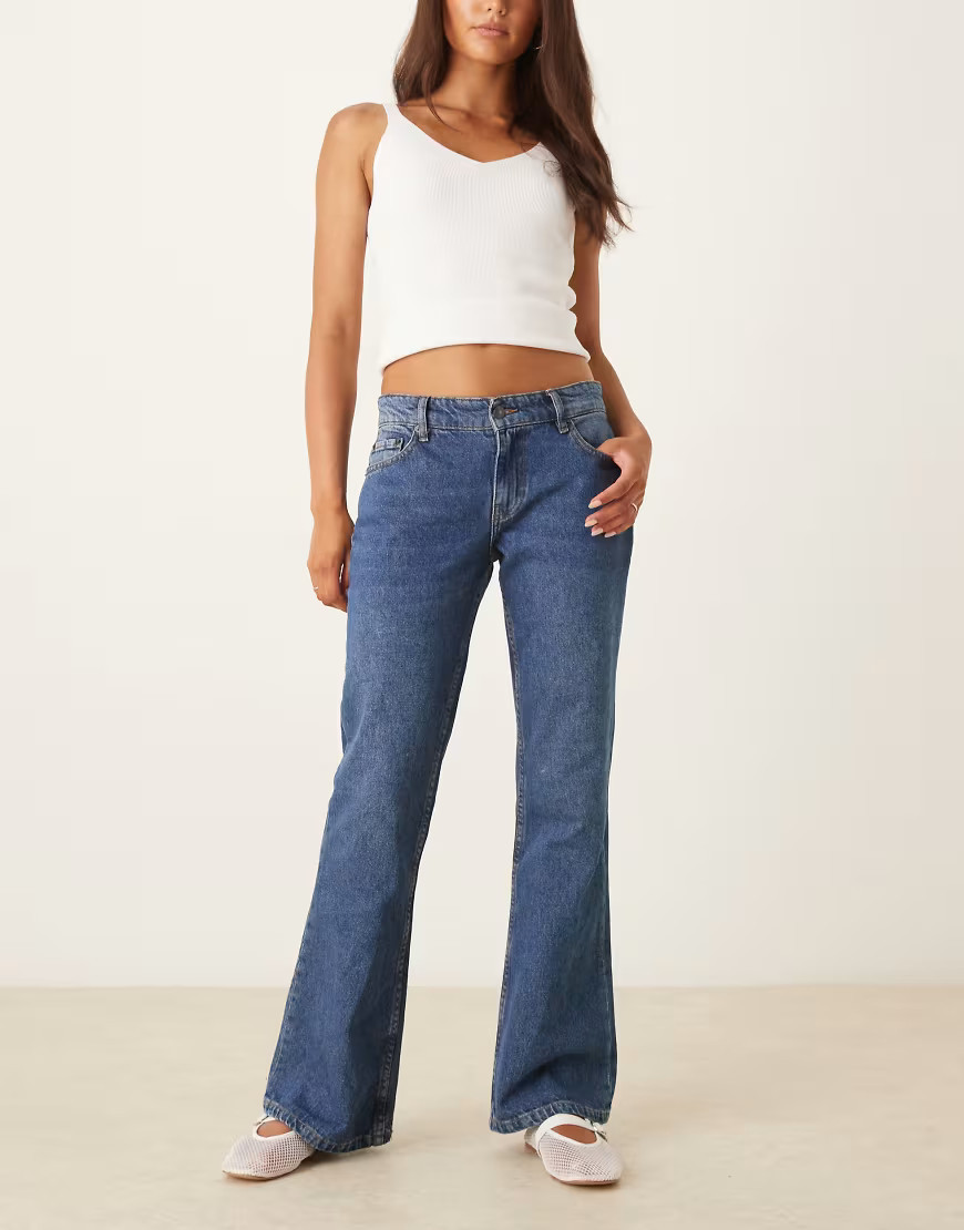 Motel rigid low rise flare jeans in mid blue used | ASOS (Global)