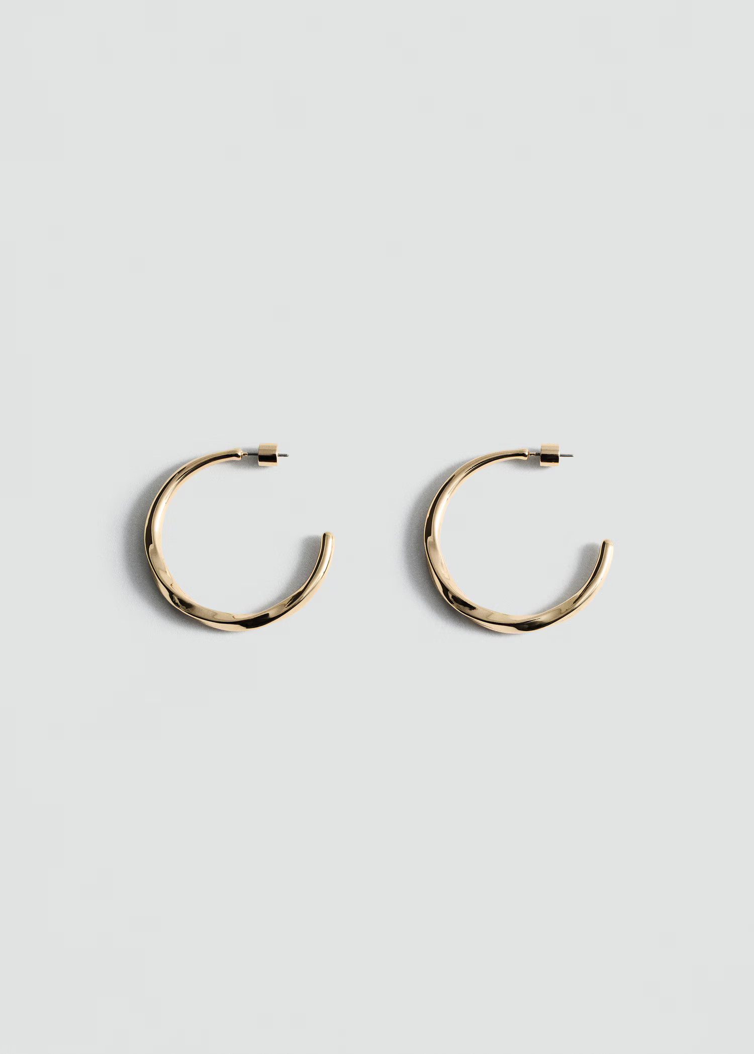 Twisted hoop earrings | Mango (US/MX/AU)