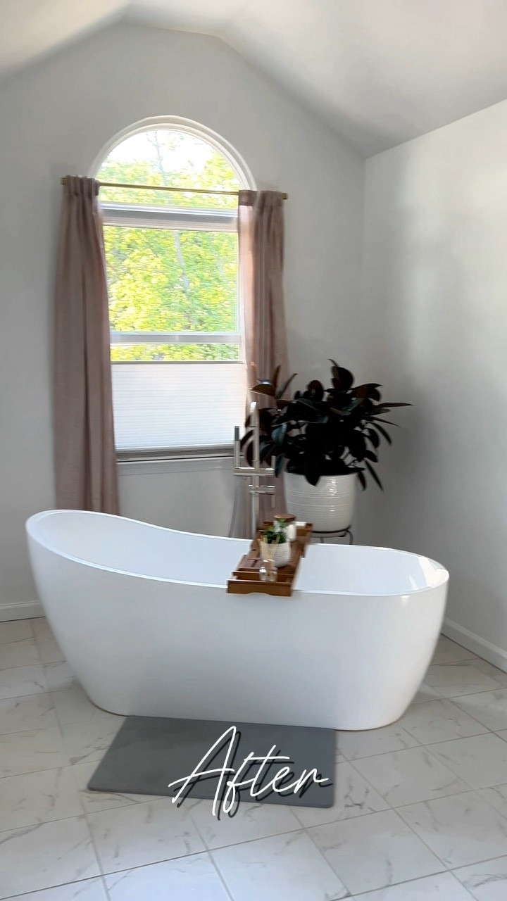 Glowing up your bathroom can be done with nothing more than some paint, spray paint and great finds! And of coarse I had to add some plants for add that pop of greenery and earthiness I love so much ☺️ … and yes, the plants are real! 

We painted the walls this beautiful white from @BenjaminMoore 
I didn’t want the pluming and hardware to be too marcha matchup so I painted the hardware and light fixture with @rustoleum bronze gold. 

Since we have a walk in shower with glass door, I decided to add curtains for texture and added color. 

The rest of the decorative items are @target and @amazon finds. 

So what do you think? Would you try this simple budget friendly bathroom glow up?

#LTKVideo #LTKStyleTip #LTKHome