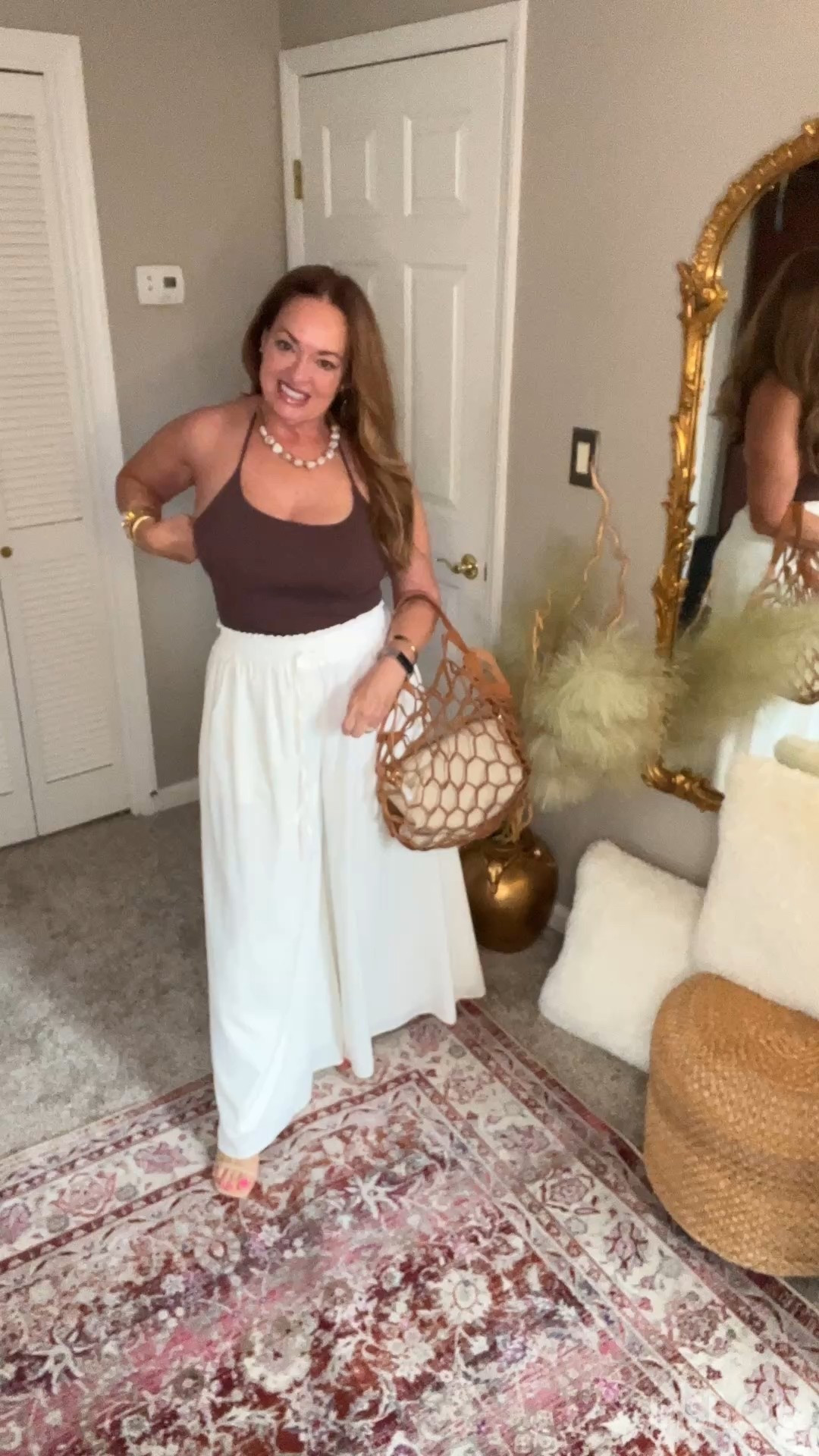 Similar to skims tank top halter style. Spring preview available in other cool colors. 

#LTKSeasonal #LTKTravel #LTKootd