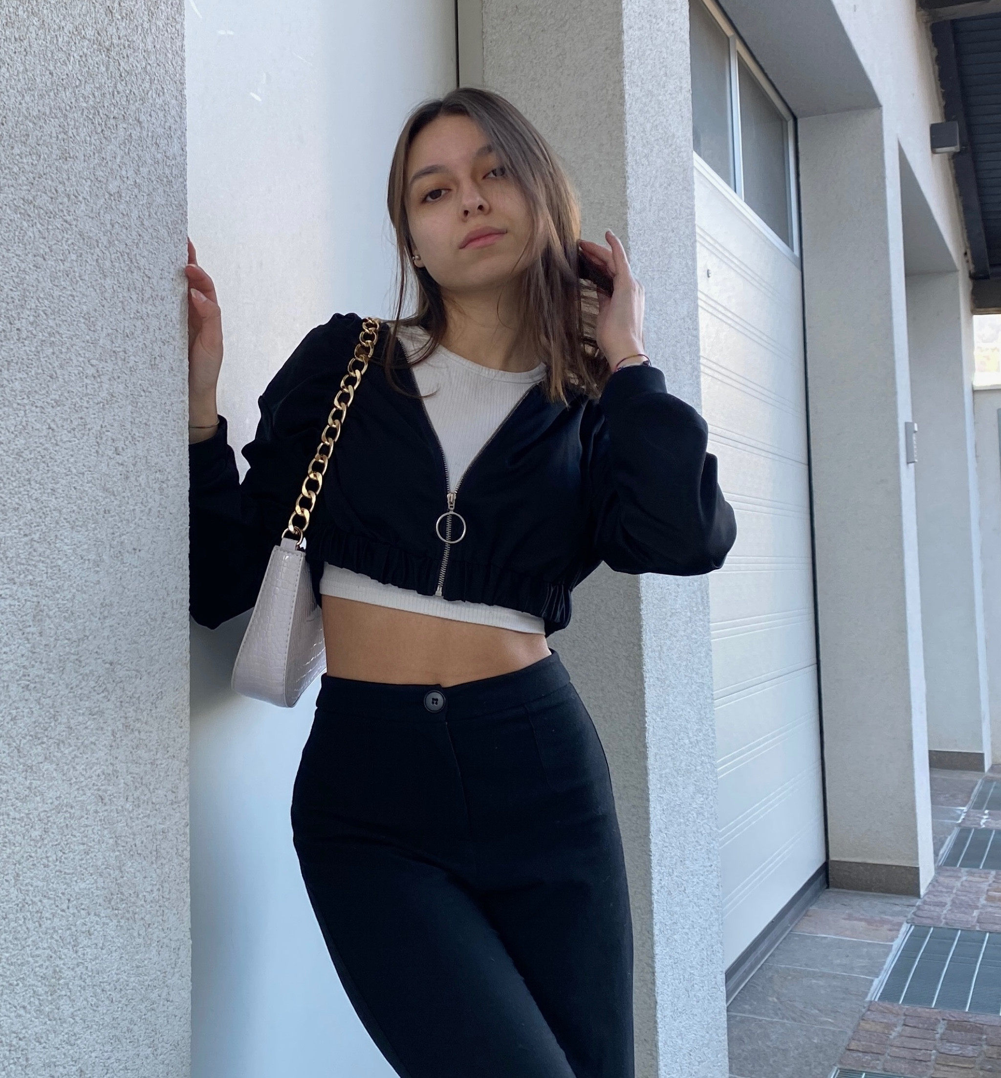 Cropped jacket, white crop top, white handbag, black trousers 

#LTKeurope #LTKfit #LTKstyletip