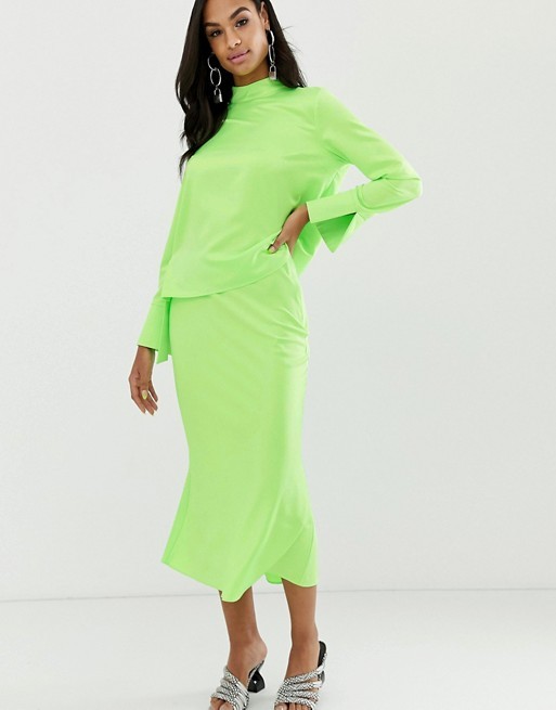 ASOS DESIGN bias cut satin slip midi skirt in neon | ASOS US