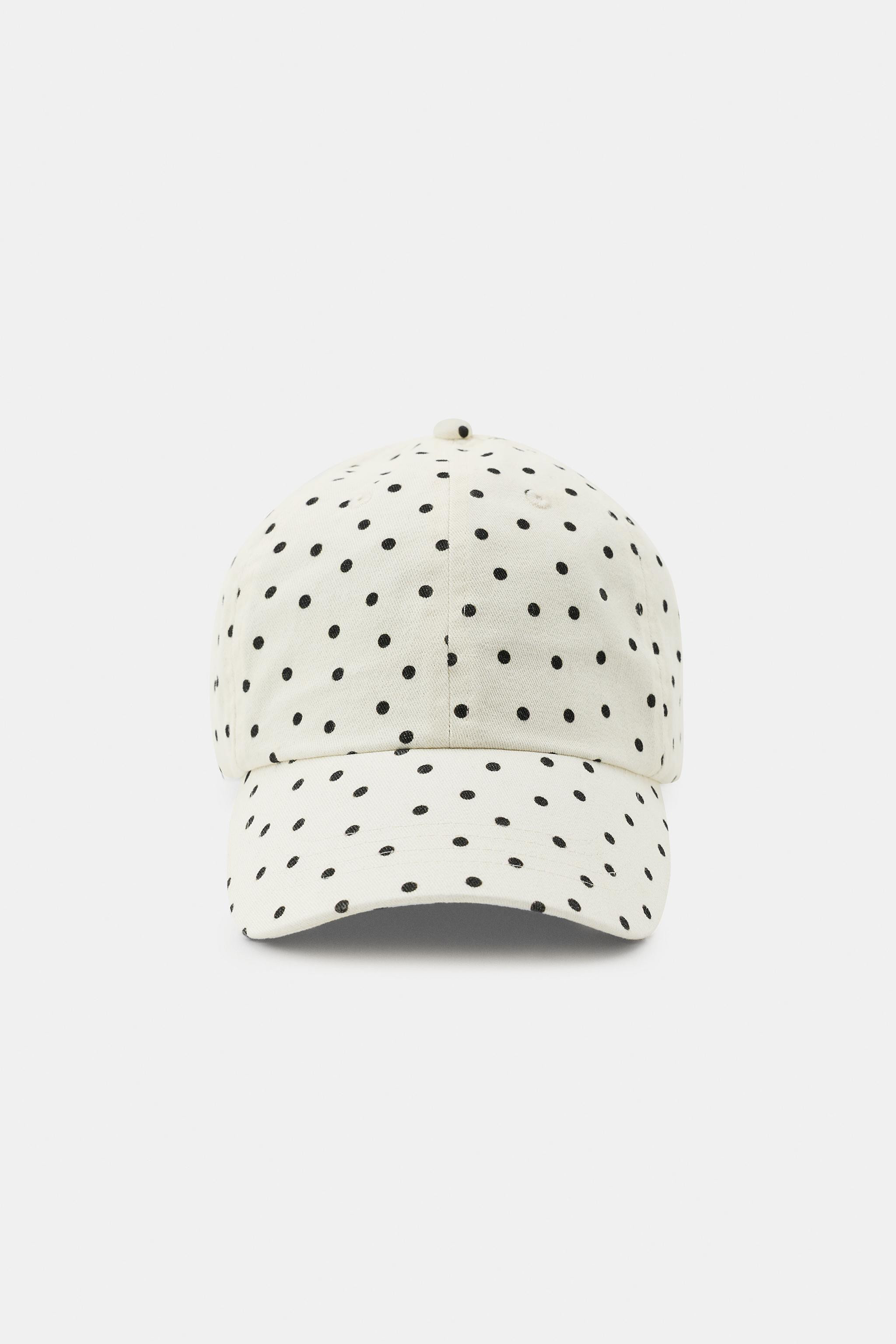 Printed cap with main fabric made from 100% cotton yarn. Features contrasting embroidered heart a... | Zara US