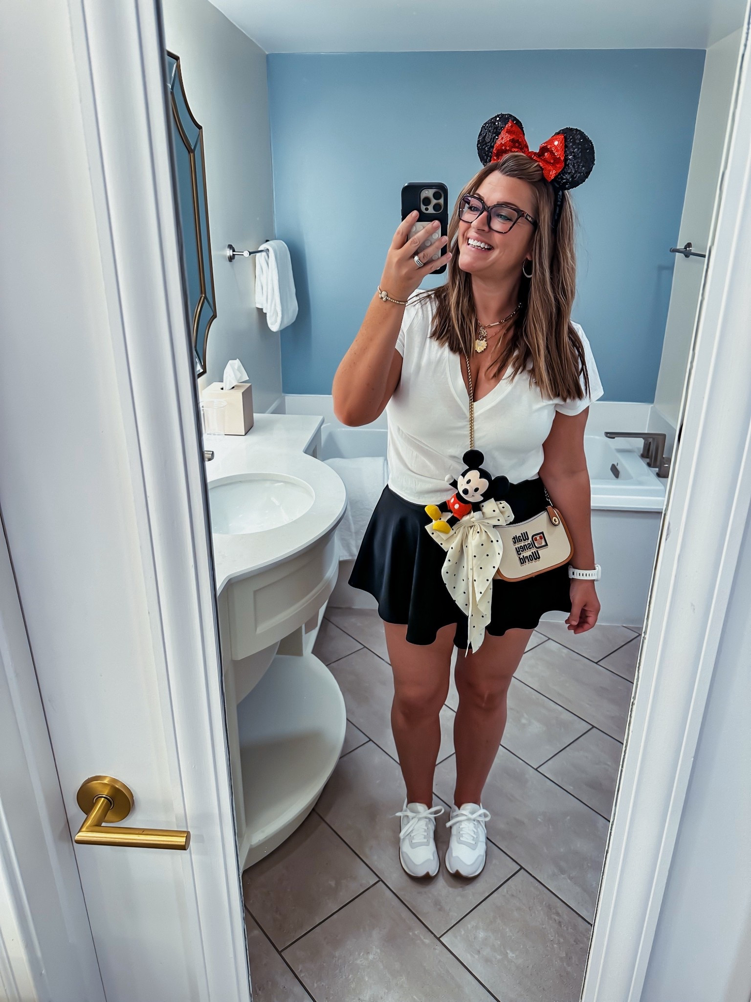 Disney Outfit! ❤️🖤🤍
This athletic skirt is my favorite! I have it in 3 colors (so far!) I can walk all day in these New Balance sneakers! 

#LTKOver40 #LTKStyleTip #LTKFindsUnder50