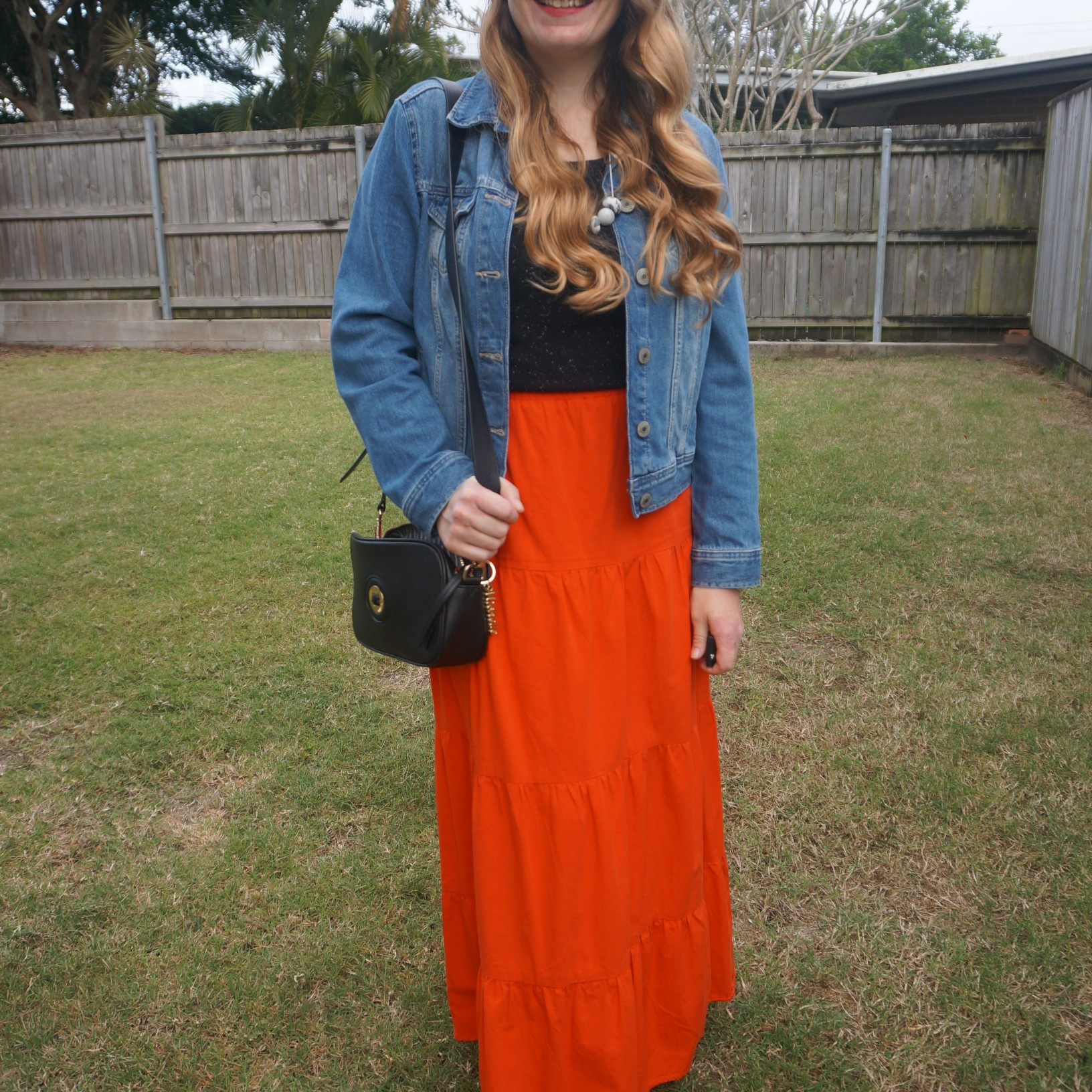 Black tee, denim jacket and red tiered maxi skirt with Mimco Mim-mazing crossbody bag ❤️

#LTKaustralia #LTKspring #LTKbag