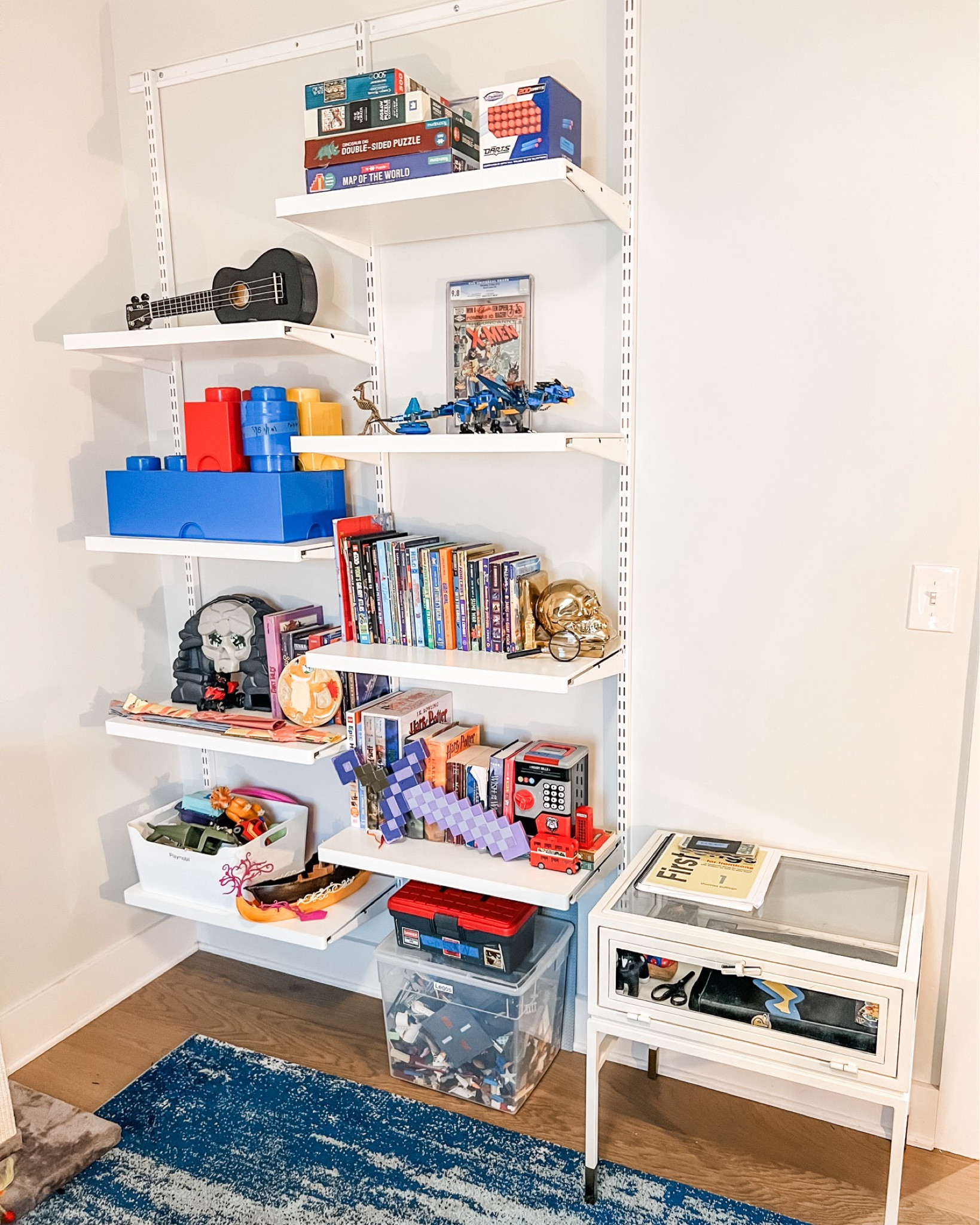 We love these elfa shelves for so much more than just closets! In this little guy's room, they solve the issue of where to put toys in a small space as older bungalows often don't offer the storage kids need. We love their versatility and flexibility making everything this kiddo needs easily visible and easily put away!