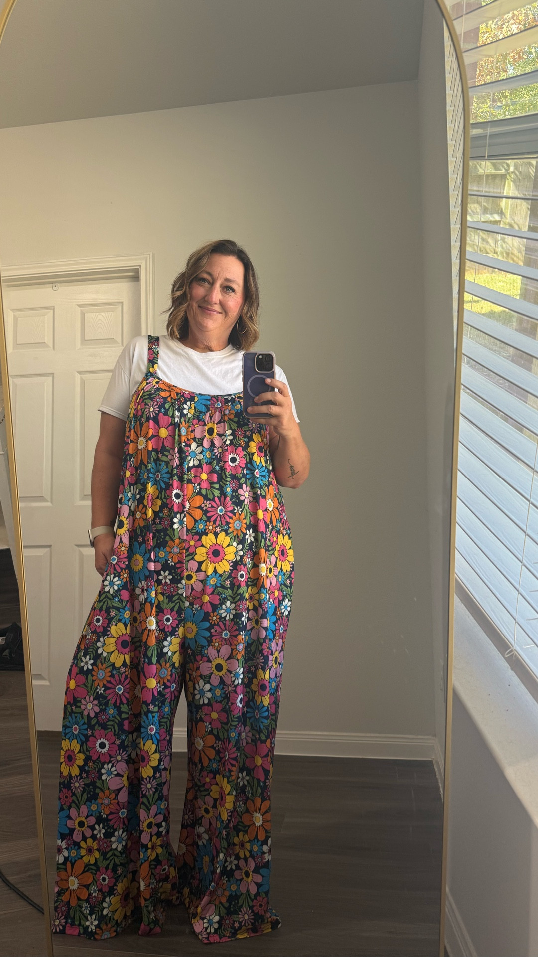 This Bloomchic floral jumpsuit is giving main character energy 🌼 So comfy, so flattering! 

#LTKWorkwear #LTKPlusSize #LTKFindsUnder50