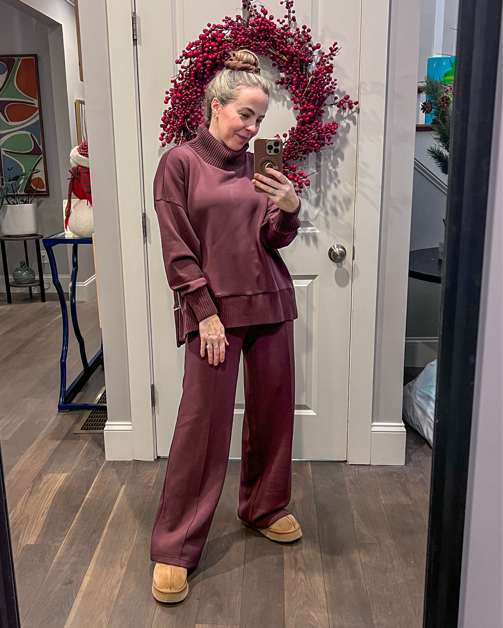 By the time you’re on holiday hosting meal number 4 and your cold is definitely kicking in, you go for a cozy matching set. Like wearing PJs but looks so much more put together. The seam on the pant leg adds polish and I love the subtle knitted ribbed trim on the top. The color is brown with just a hint of red/purple. Throw the hair up in your SleepyTie to maintain your blowout indefinitely.

#LTKOver40 #LTKHoliday
