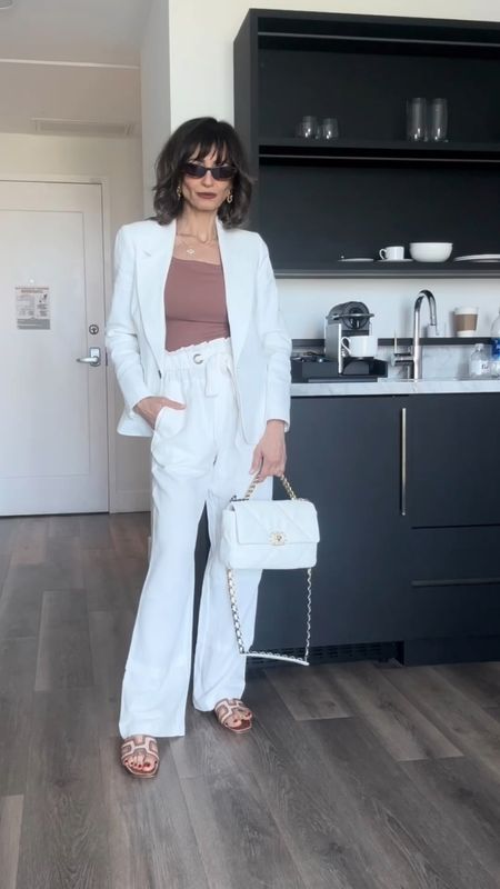 Super classic white Spring/Summer look! 

These linen pants are gorgeous from En Saison. They fit true to size. Same for blazer.

The Target top comes in many colors and also fits true to size 

The Hermes sandal is not available to link, but I linked similar ones

#LTKtravel #LTKfindsunder50 #LTKstyletip