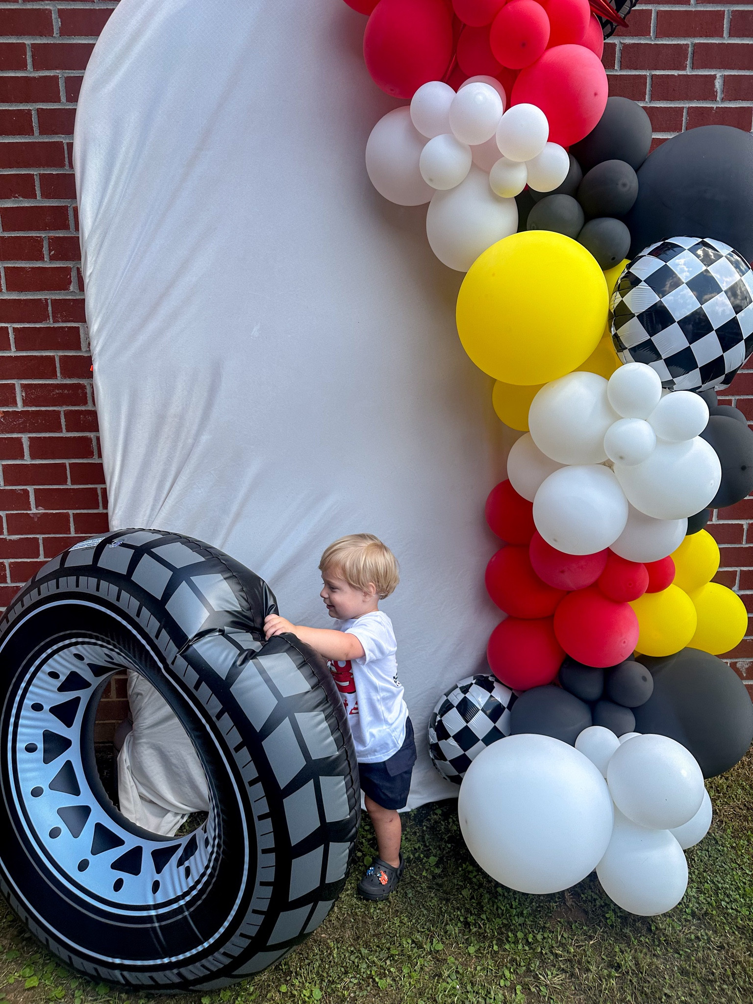 Tire float is from five below! I ended up purchasing a metal backdrop from Amazon super cheap! It’s only $30 and great quality! Bought some clamps for $3.99 to go with it and used a white flat sheet from home! Very easy and simple backdrop! 

#LTKParties #LTKFindsUnder50 #LTKKids