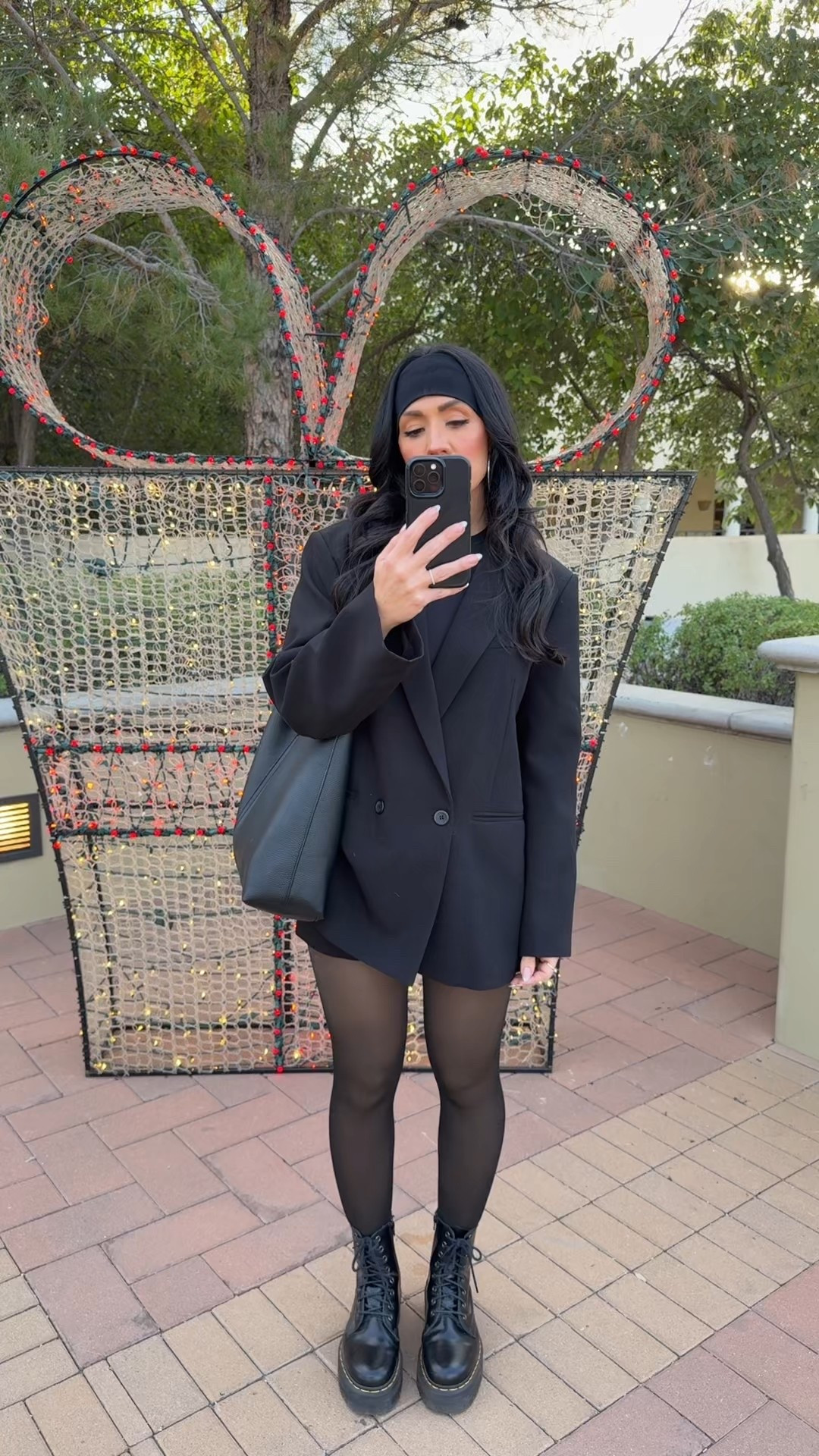 Spent the evening with family at a local resort for Christmas festivities! I went with all black (classic Nicky) but a bold red lip // 
Dynamite oversized blazer size small
Fleece lined tights 
Doc marten boots 
Clarins red lip oil & stain 



#LTKHoliday #LTKootd #LTKSeasonal