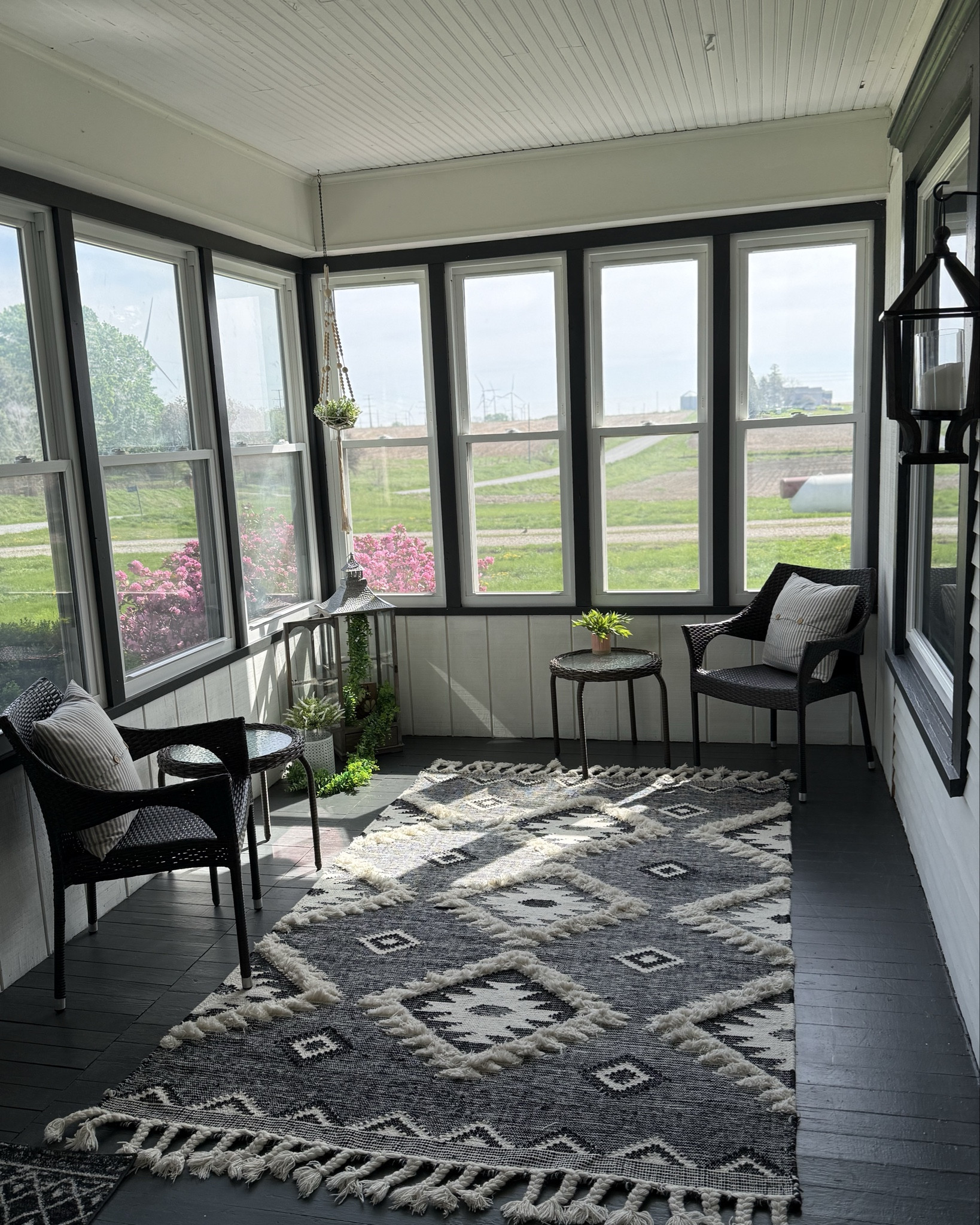 Obsessed with this reno of our farmhouse porch in Iowa! #farmhouse #iowa #iowafarmhouse #homereno #frontporch 

#LTKmorningroutine #LTKHome #LTKSeasonal