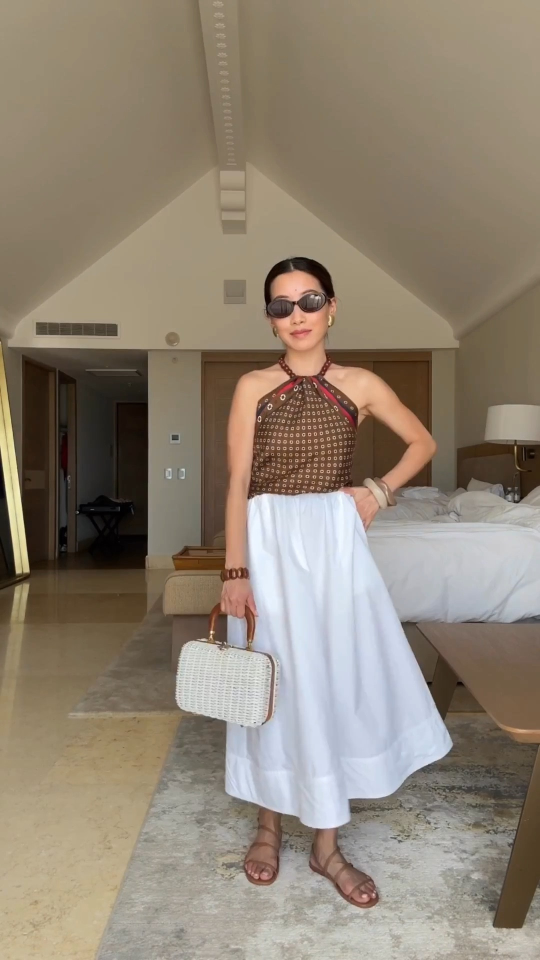 Cotton skirt on flash sale! Unlined so you need to wear skin toned undergarments with the white, but it’s super light and breathable in the heat 

• Jcrew skirt xxs regular (im 5 ft tall) - pockets, stretchy waist runs a little big , unlined which makes it super light and breathable but wear skin tones undies .

The same skirt in xxs petite runs smaller and shorter. I also tried the brown and preferred petite in the brown color.

Petite xxs is 11.5” across waist, 26” length 
Regular xxs is 12.5” across waist, 29” length

• Marc Fisher strappy sandals TTS 5.5 comfortable and minimal

• Madewell silk scarf worn as a top 

• Amazon bandeau xxs (fits small but stretchy)

• Madewell sunglasses, Amazon bangles, and vintage wicker bag

Spring break vacation, resort wear, beach or pool style , how to tie a silk scarf 

#ltktravel #ltkseasonal #ltkpetite