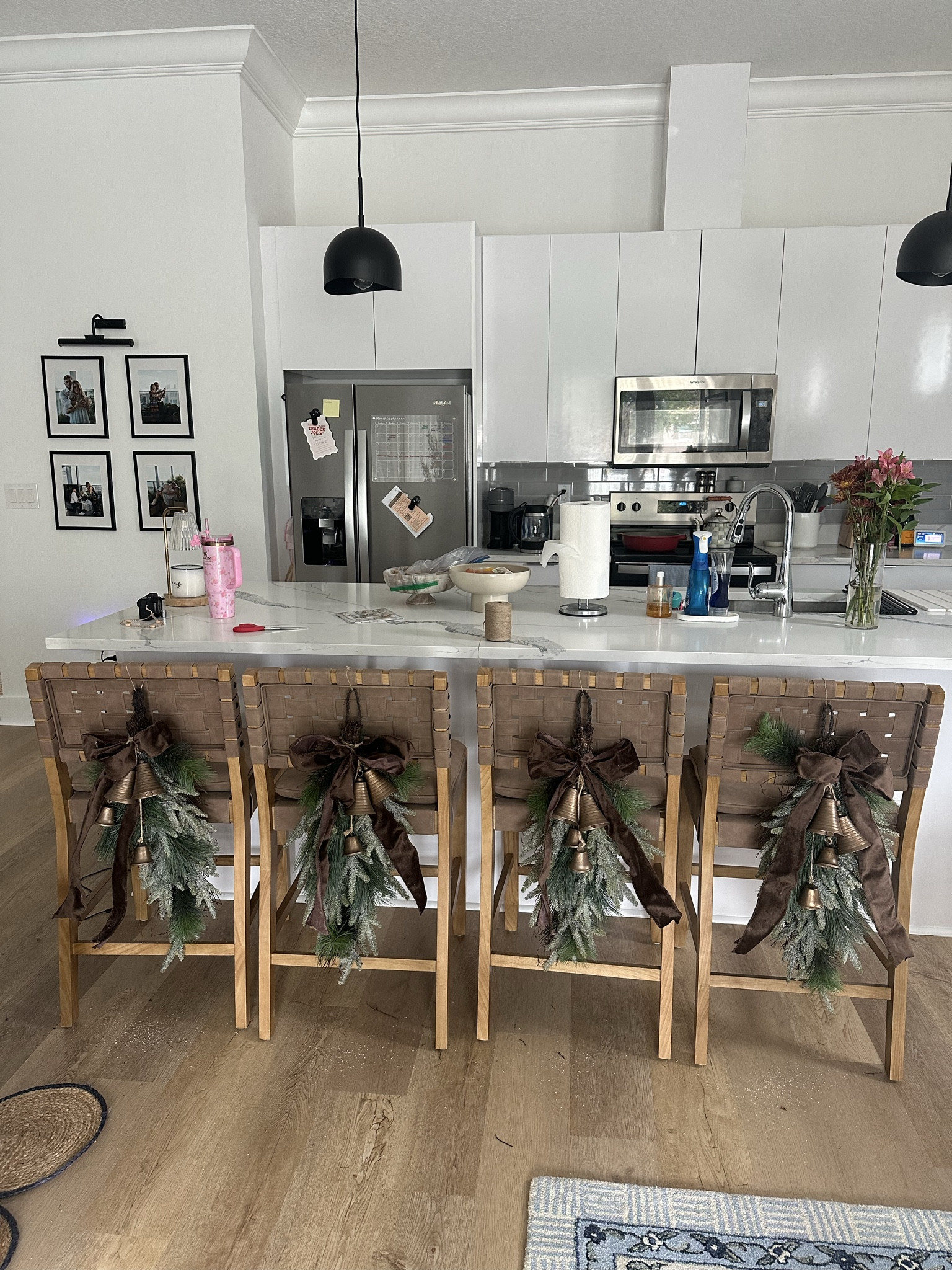 I used twine to tie it to each chair! Bells, Bow, and Greenery Decorative Christmas Door Swag, Green and Brown, 28", by Holiday Time

#LTKHoliday #LTKFindsUnder50 #LTKHome