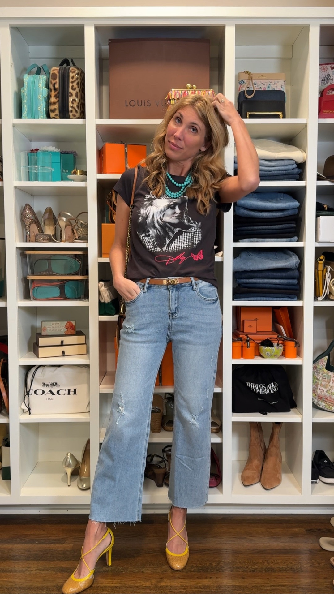 Last night was SINGO Tuesday at the country club and I wore the cutest new cropped jeans from Amazon! They’re a little distressed, but just slightly, and have a raw hem. I’m wearing a 4 (I’m usually a 27” waist in jeans). 

I paired the jeans with a little Dolly tee, turquoise beads, heels, and a fringe bag.