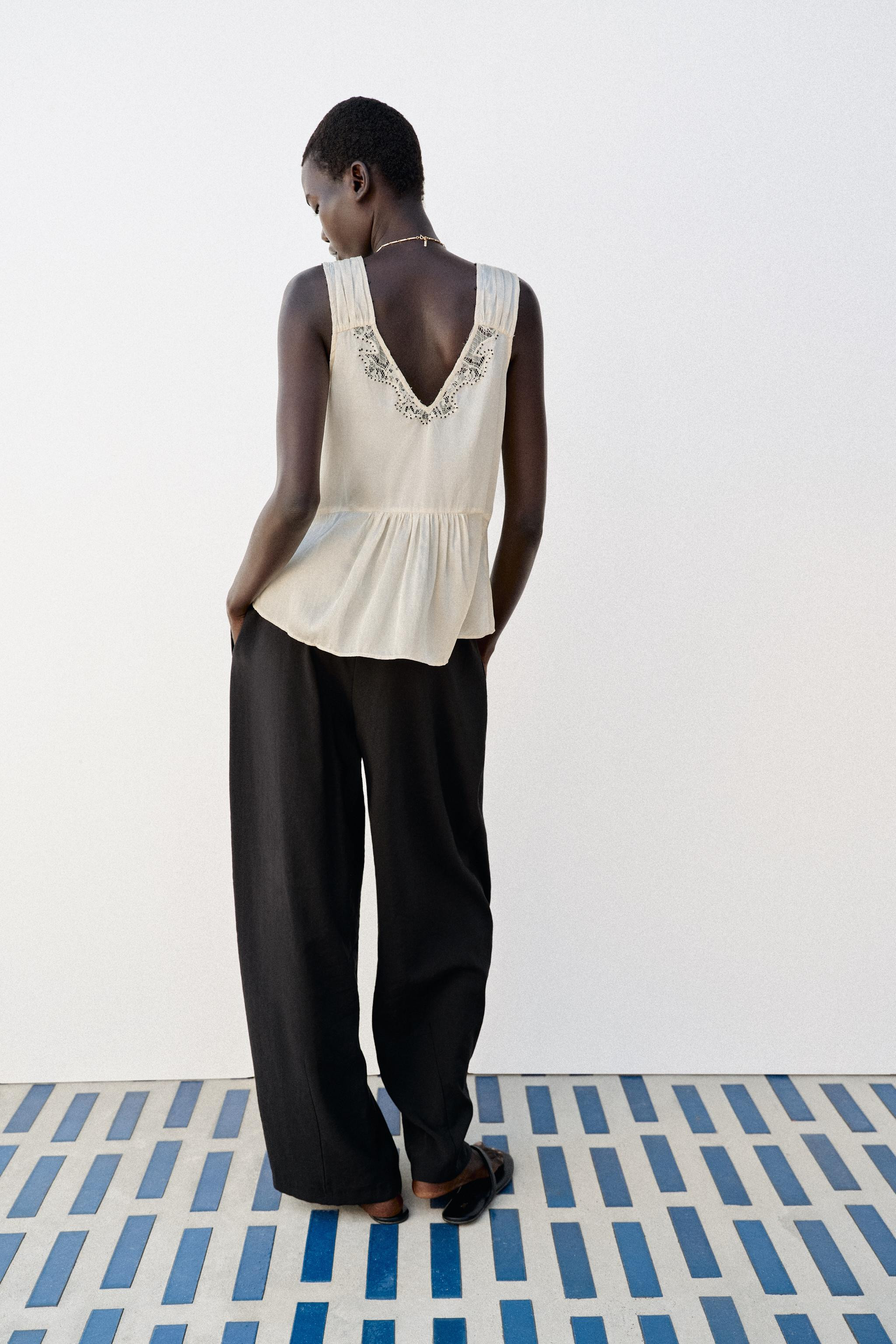V-neck top with wide beaded straps. Features mixed fabric detailing with lace and tucks. | Zara US