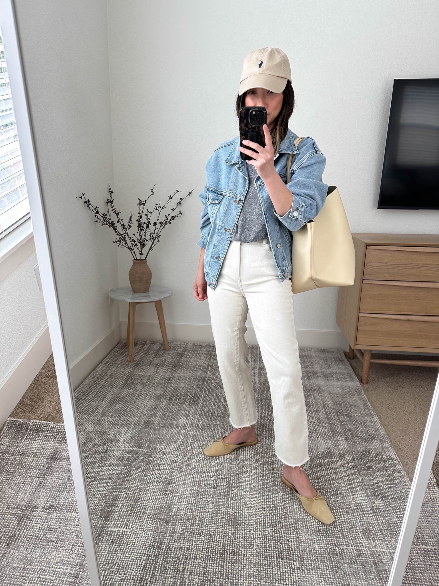 AGOLDE Charli jean jacket. DL1961 Patti jeans. Some of my favorite wardrobe staples. 

Jacket - AGOLDE xs. Runs oversized. 
Tee - Free Assembly xs
Jeans - DL1961 25
Mules - Doen 35
Tote - Mansur gavriel. Color is crema 
Hat - Polo Ralph Lauren 

Petite Style, Neutral outfit, capsule wardrobe, minimal style, street style outfits, Affordable fashion, Spring fashion, Spring outfit, jeans, sandals. 

#LTKshoecrush #LTKitbag #LTKsalealert