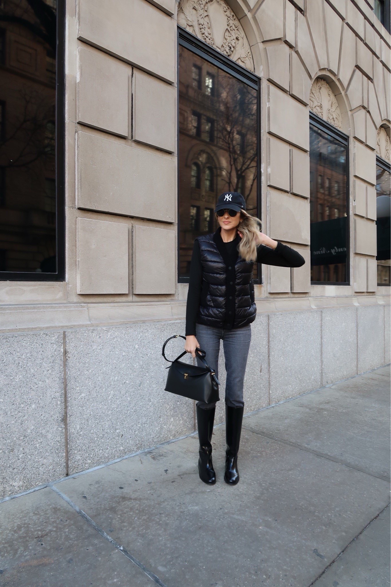 Casual chic outfit idea I wore in New York. Love the boots over the jeans, the black vest has a shine to it that automatically elevates the look. Perfect for spring break if you are going to a cold destination!Everything runs true to size, I’m wearing size small. 


#LTKootd #LTKU #LTKTravel