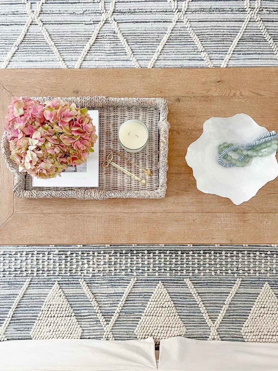 Everything on my coffee table, except the candle, is from Amazon! My coffee table has been discontinued, so l linked a similar one with the same color (sea drift)!
- 
Coastal Coffee table decor, coastal living room decor, coffee table styling, tray decor, decorative bowls, amazon home decor, coastal decor, beach house decor, blue and white rugs, coastal rugs, 8x10 rugs, 9x12 rugs, living room rugs, bedroom rugs, dining room rugs, decorative bowls, peony bowls, coffee table bowls, pottery barn coffee table, amazon coffee table books, amazon decorative beads, sea glass, denim rug, serena and lily rugs, coastal home decor, coastal style, living room furniture, coastal style, coastal amazon decor, amazon trays, white coffee table books

#LTKHome #LTKFindsUnder50 #LTKFindsUnder100