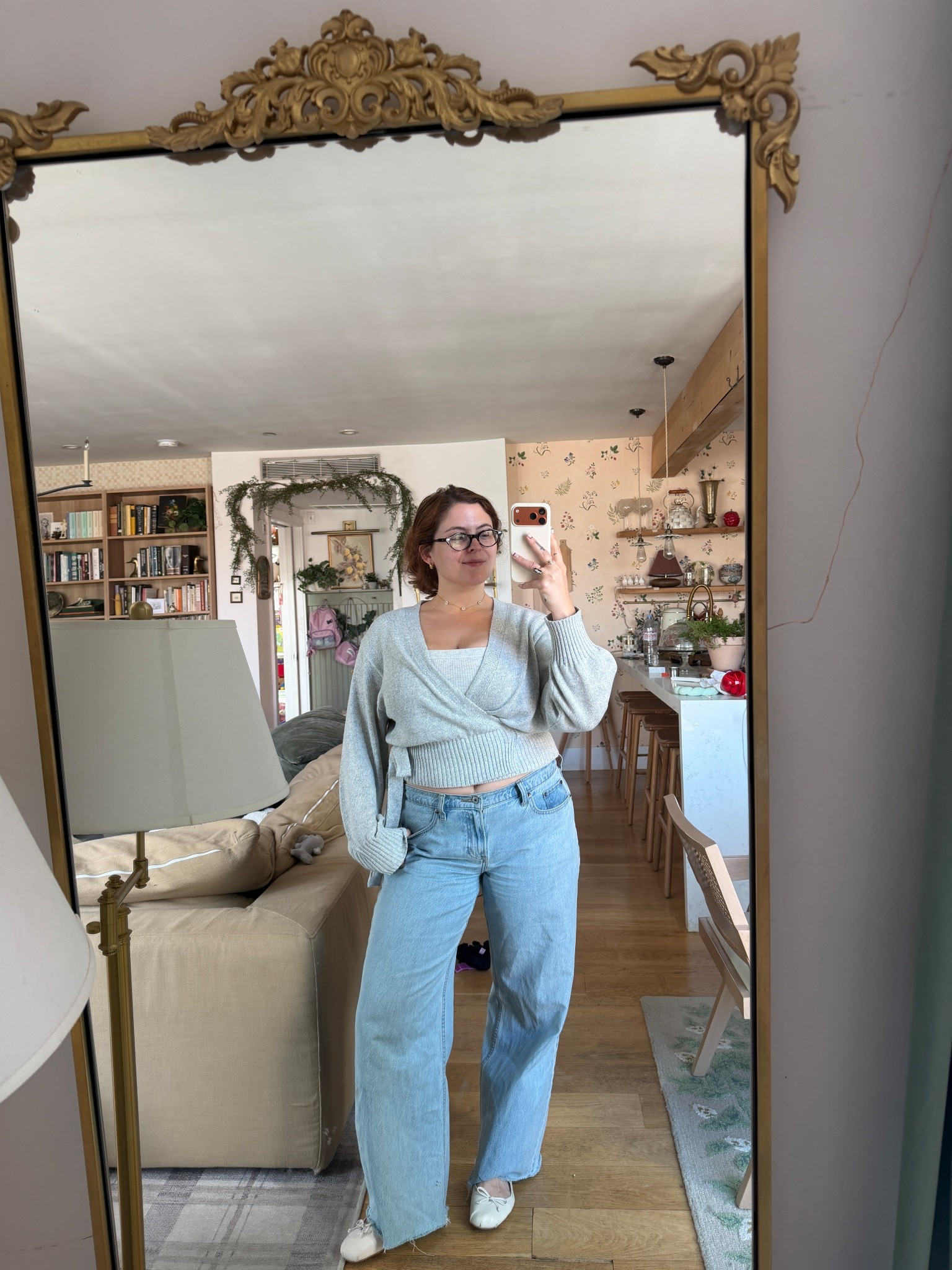 Gray wrap around long sleeve sweater

Abercrombie raw hem jeans 

#LTKSeasonal #LTKMidsize #LTKSaleAlert