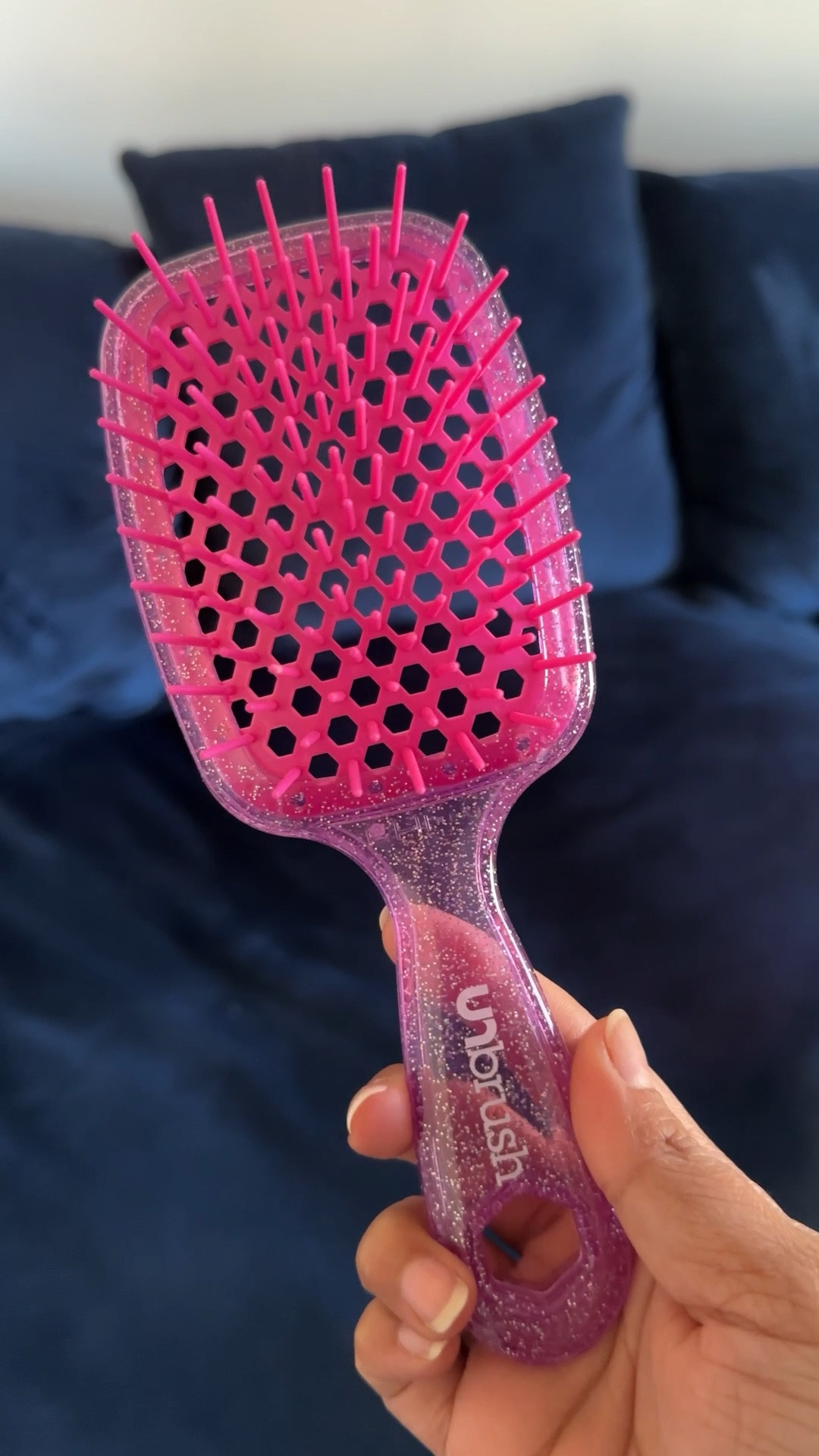 Tiktok viral unbrush - hairbrush that detangles hair gently and is super lightweight! 

#LTKstyletip #LTKGiftGuide #LTKbeauty